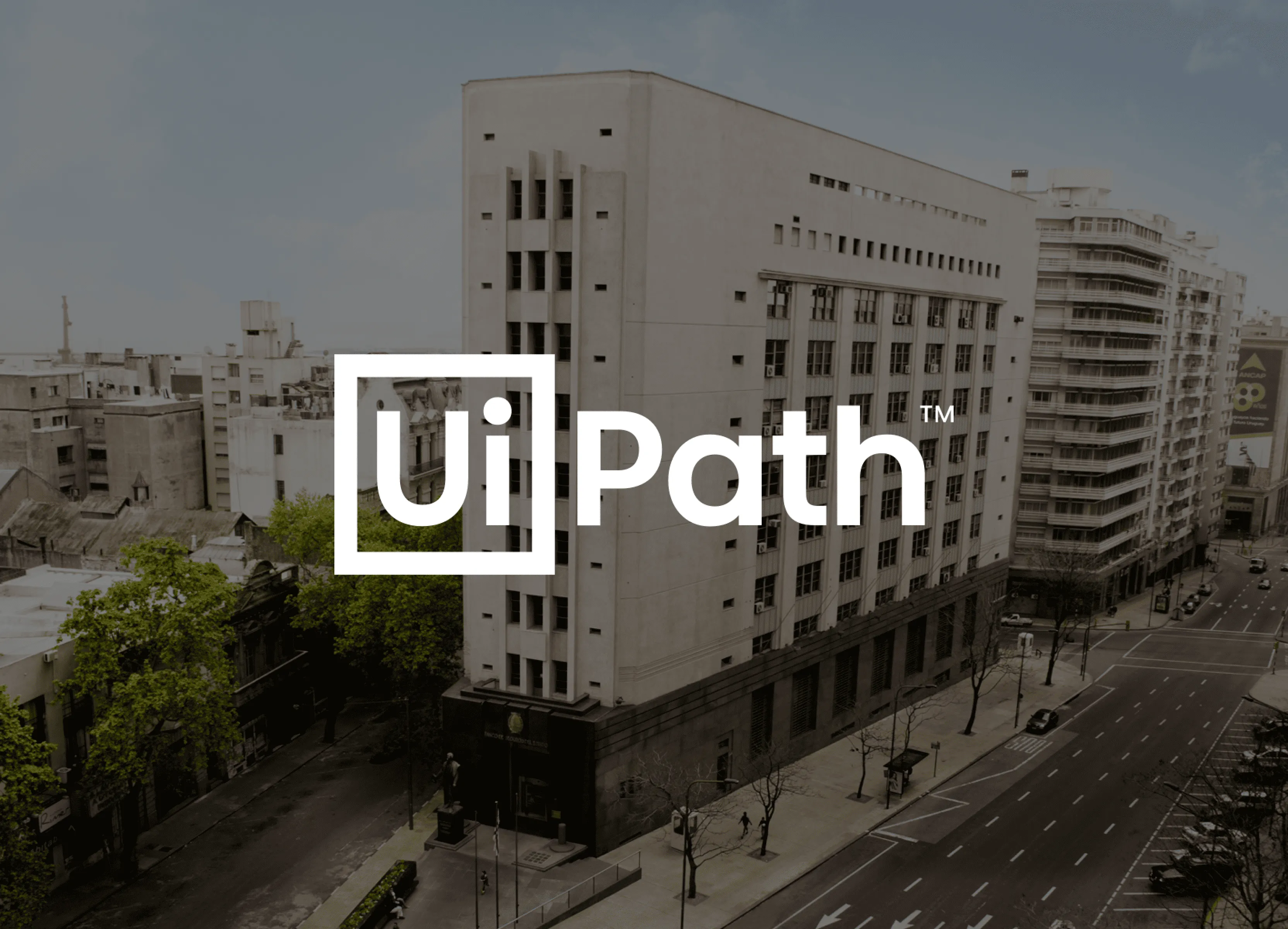 UiPath logo over the Banco Central del Uruguay building in Montevideo.