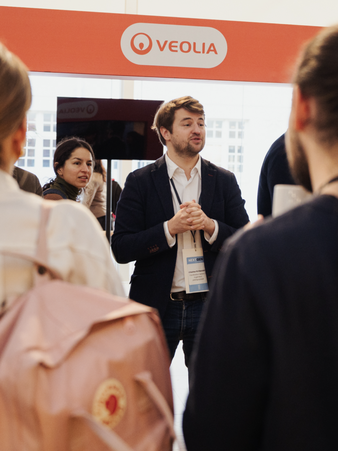 a company representative presents his company on a student gathering 