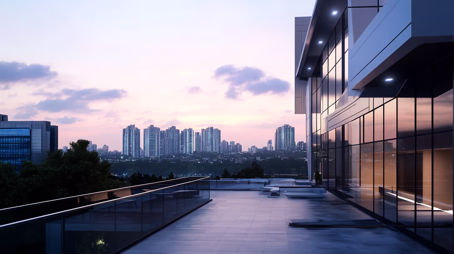 Rooftop terrace overlooking a city skyline at dusk