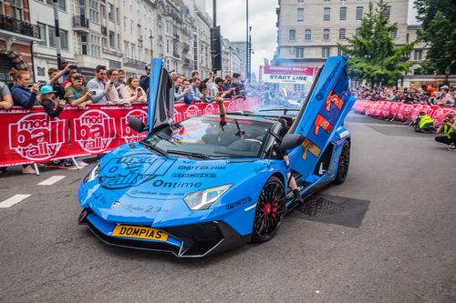 electrician in cap wiring plug socket
