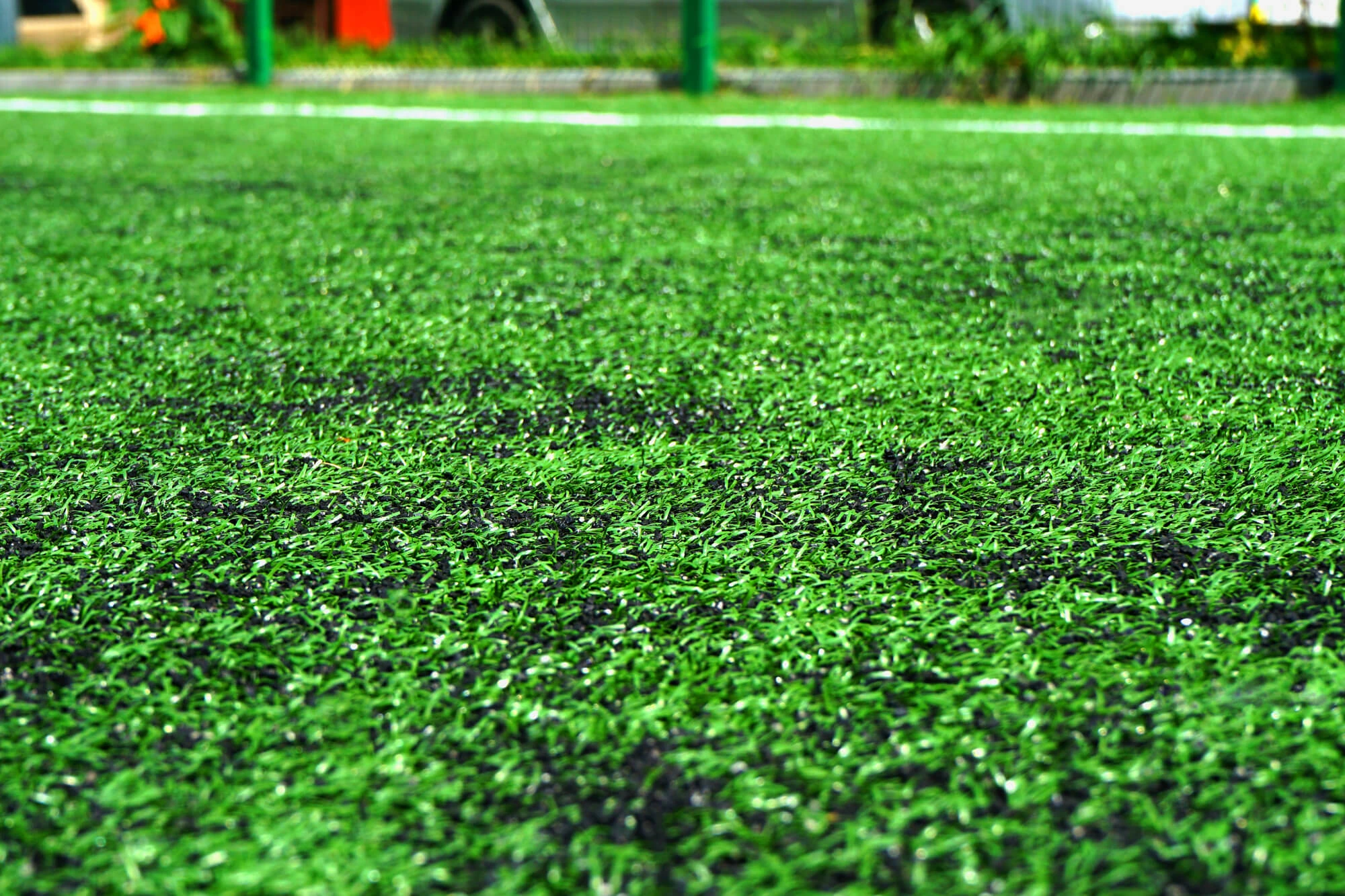 Damaged Artificial Grass on Pool Surrounds