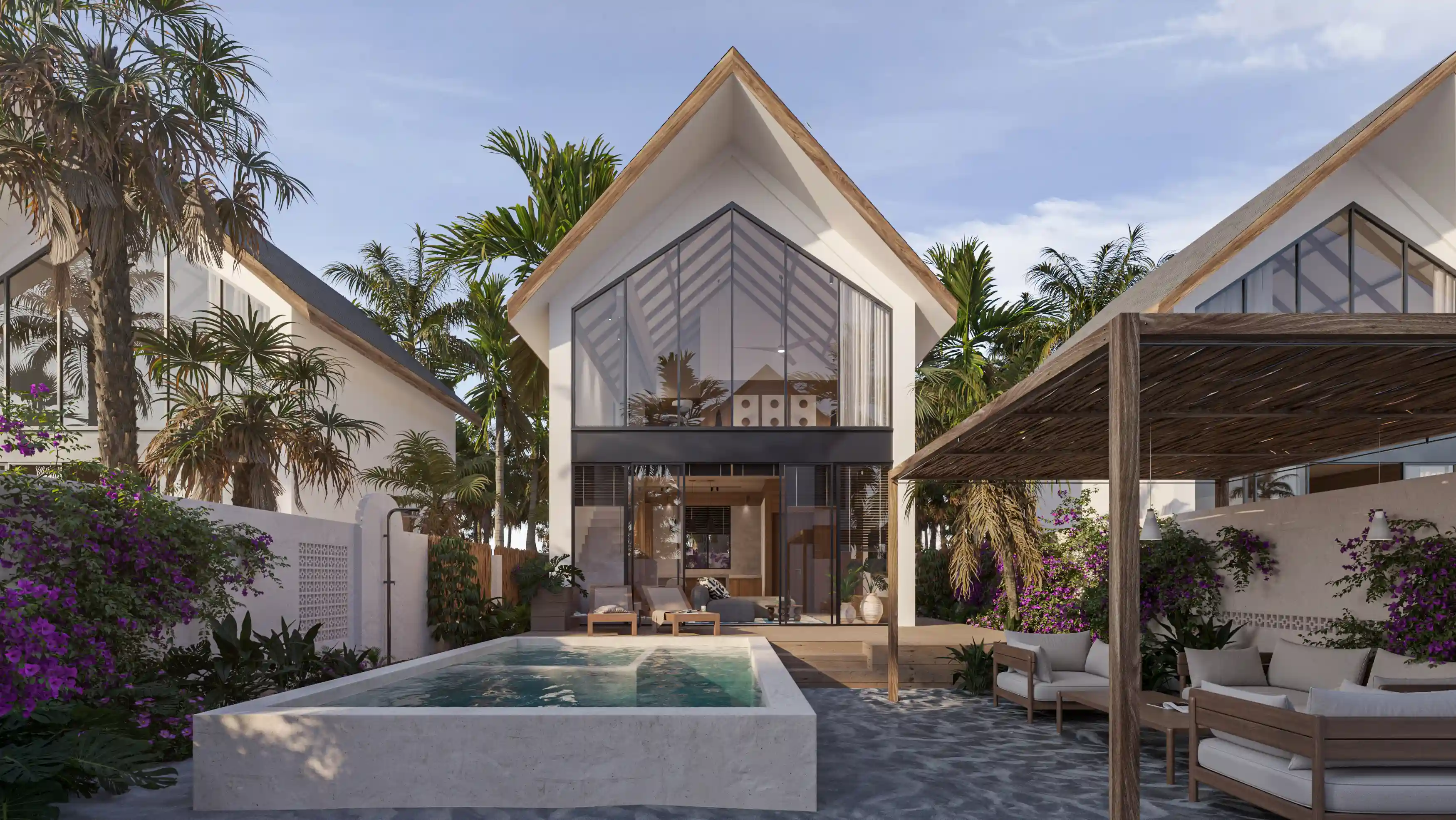 Modern villa with large glass windows, a private pool, patio seating, and tropical plants around.