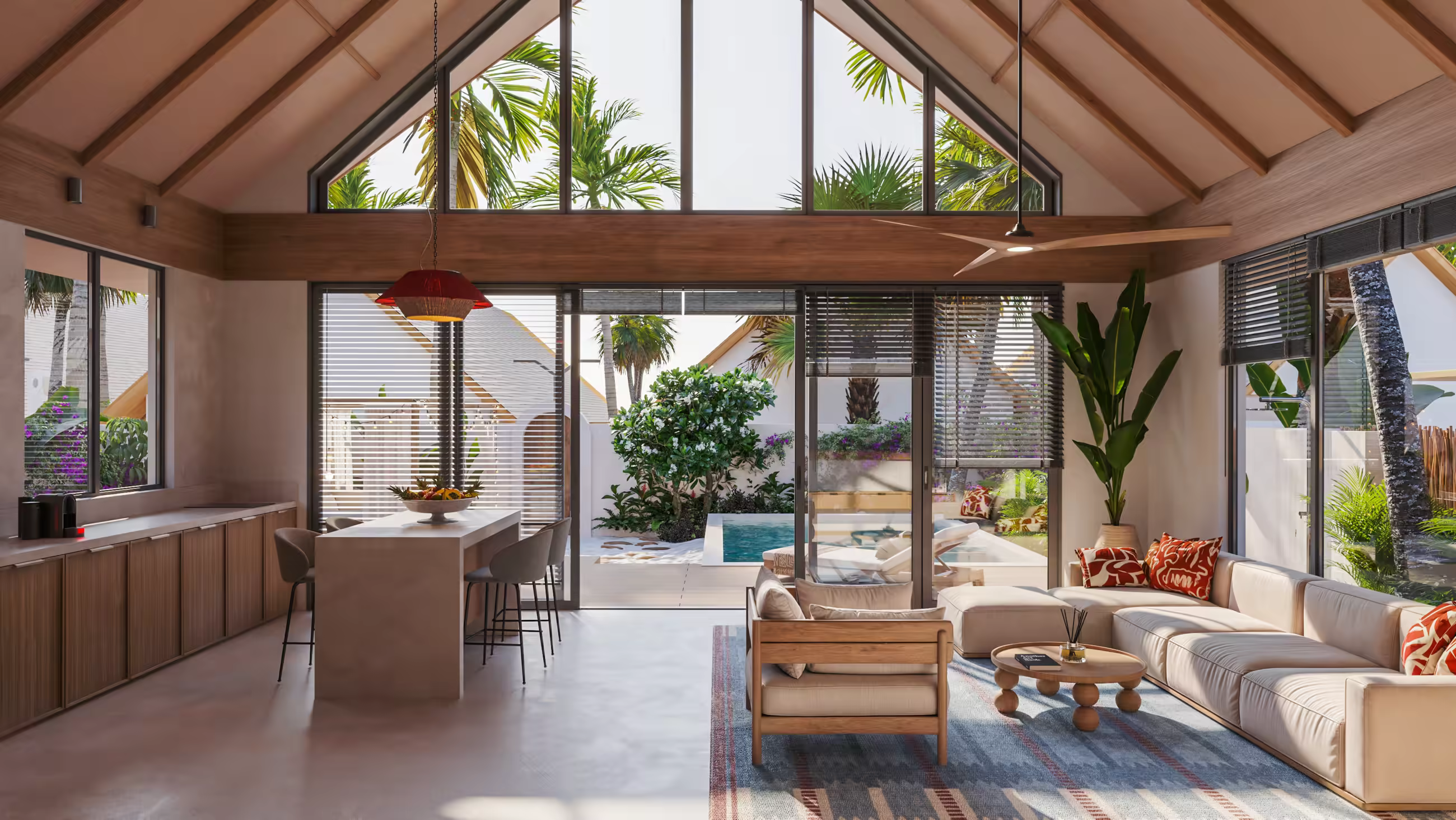 Open-plan villa living and dining room with vaulted timber ceiling, opening onto a courtyard pool