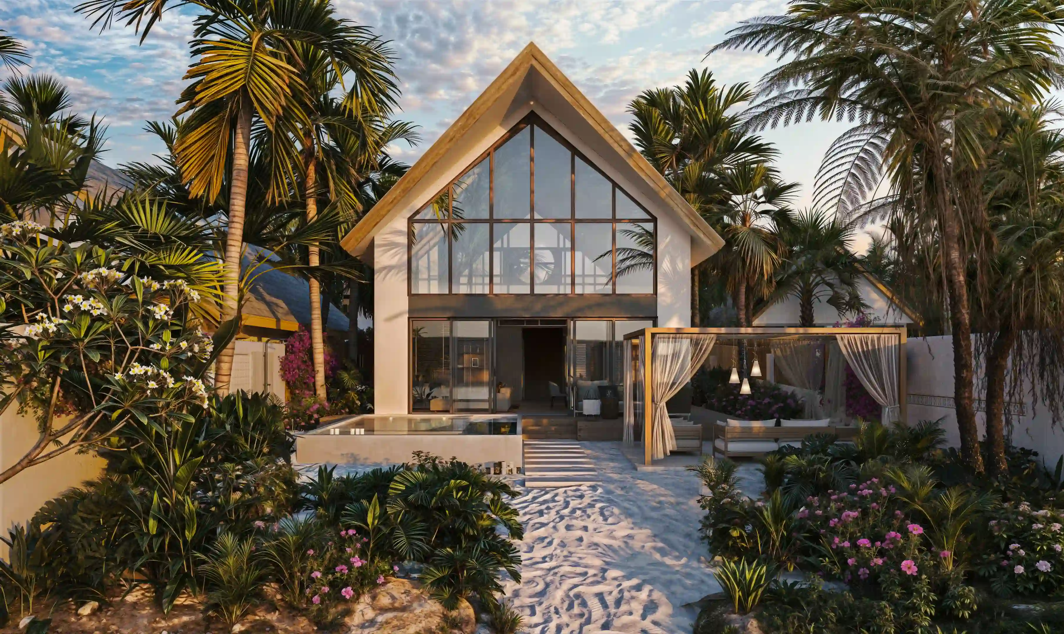 Modern bungalow with large glass facade, surrounded by tropical plants and outdoor seating area with curtains.