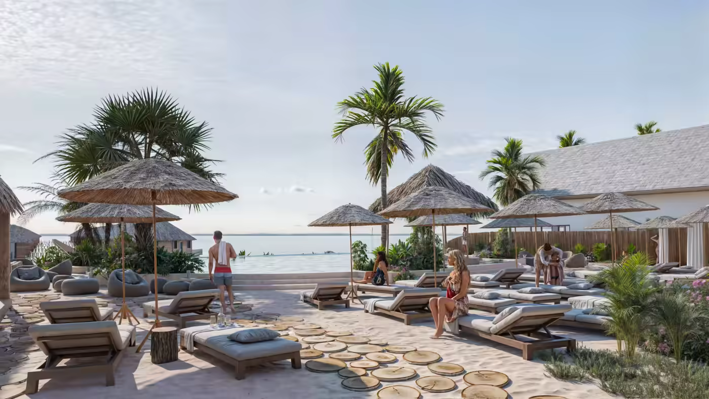 The Rock restaurant standing on a coral outcrop off Zanzibar's east coast, reached by a wooden staircase across the reef at low tide