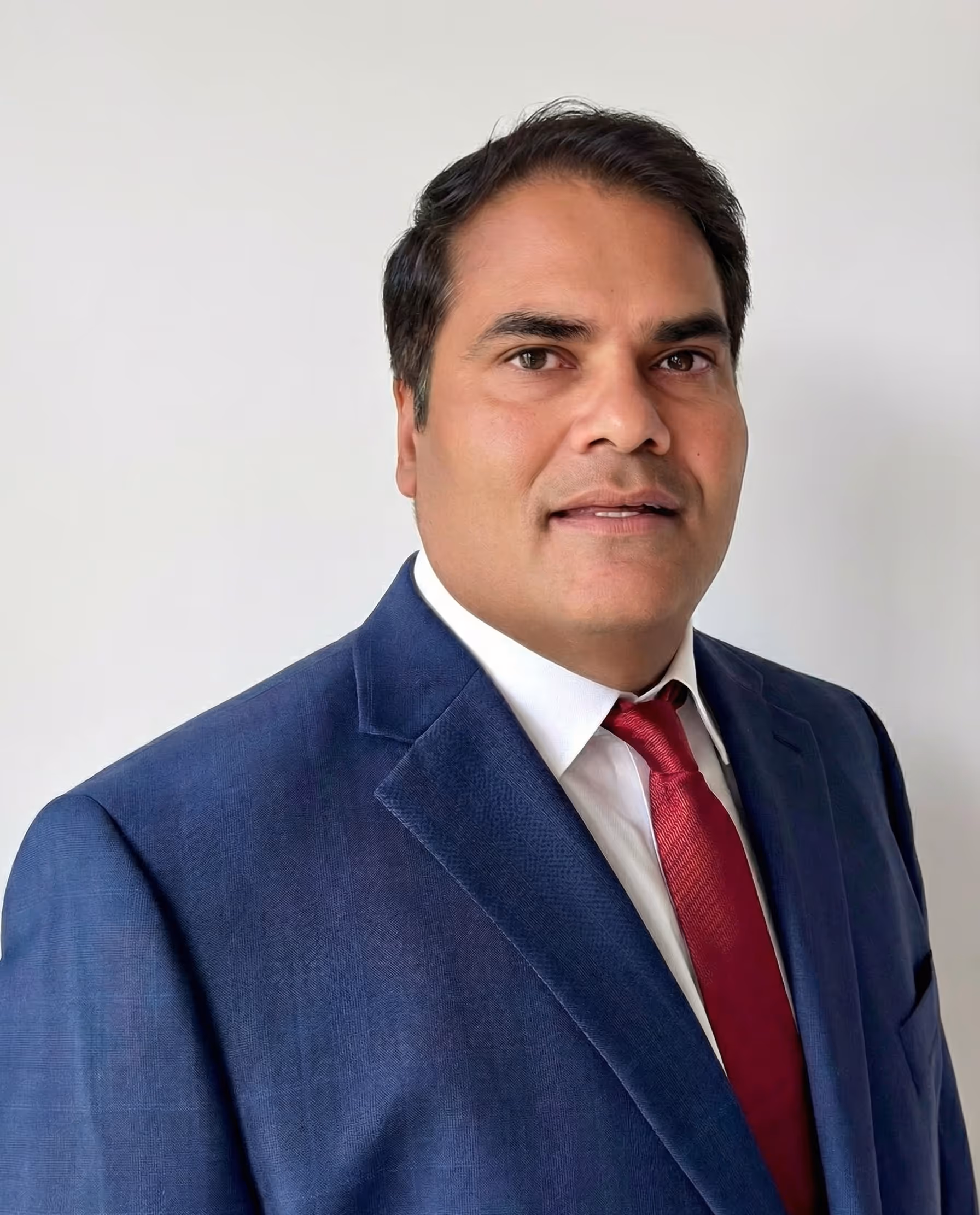 Headshot of the founder, Ashok Kumar Adusumilli