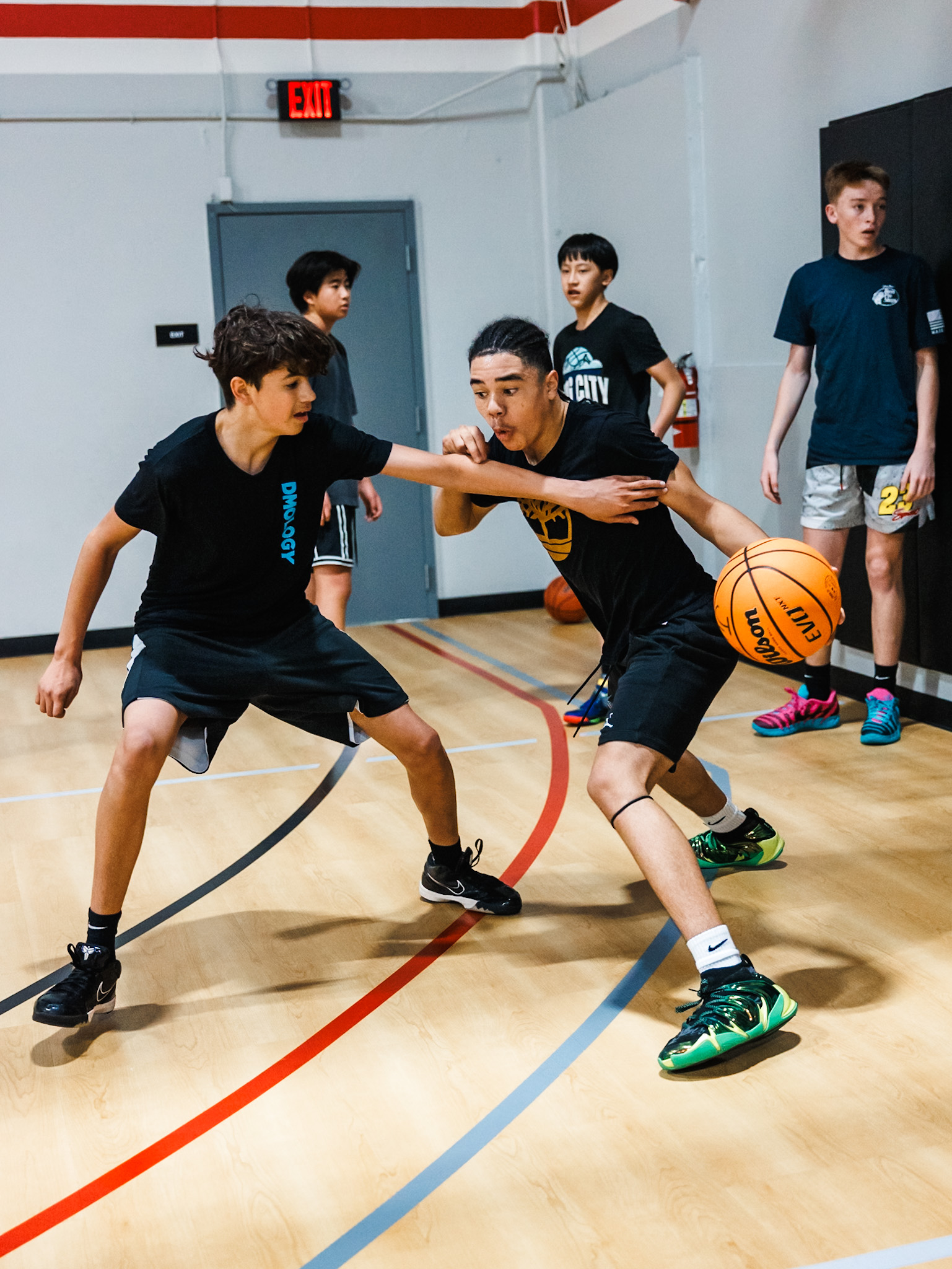 Camp participants using interactive shooting and passing stations during a basketball clinic at Shoot 360 San Mateo.