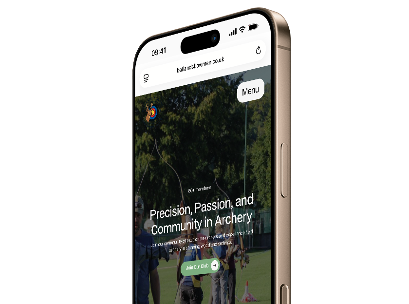 Laptop displaying the Ballands Bowmen Archery Club website featuring a green woodland-inspired design and archery imagery.