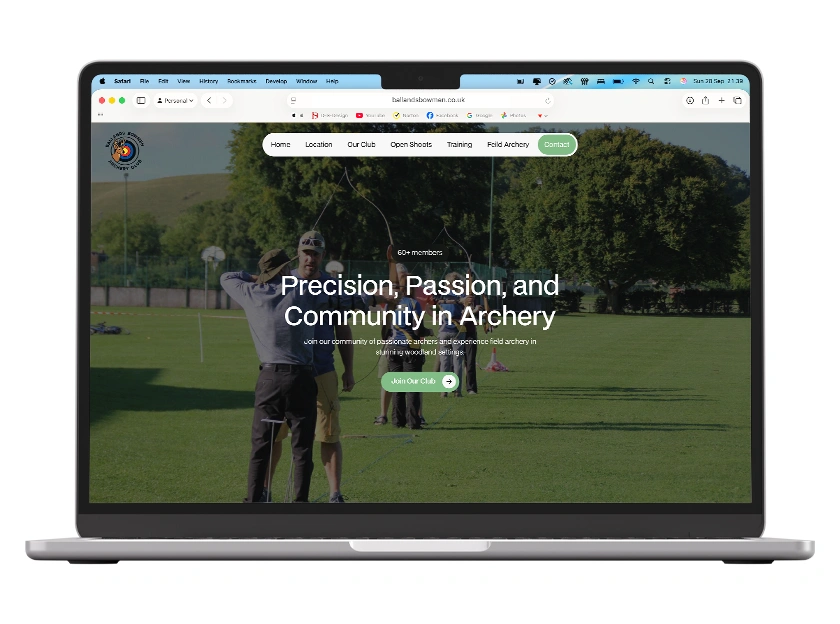 Laptop displaying the Ballands Bowmen Archery Club website featuring a green woodland-inspired design and archery imagery.