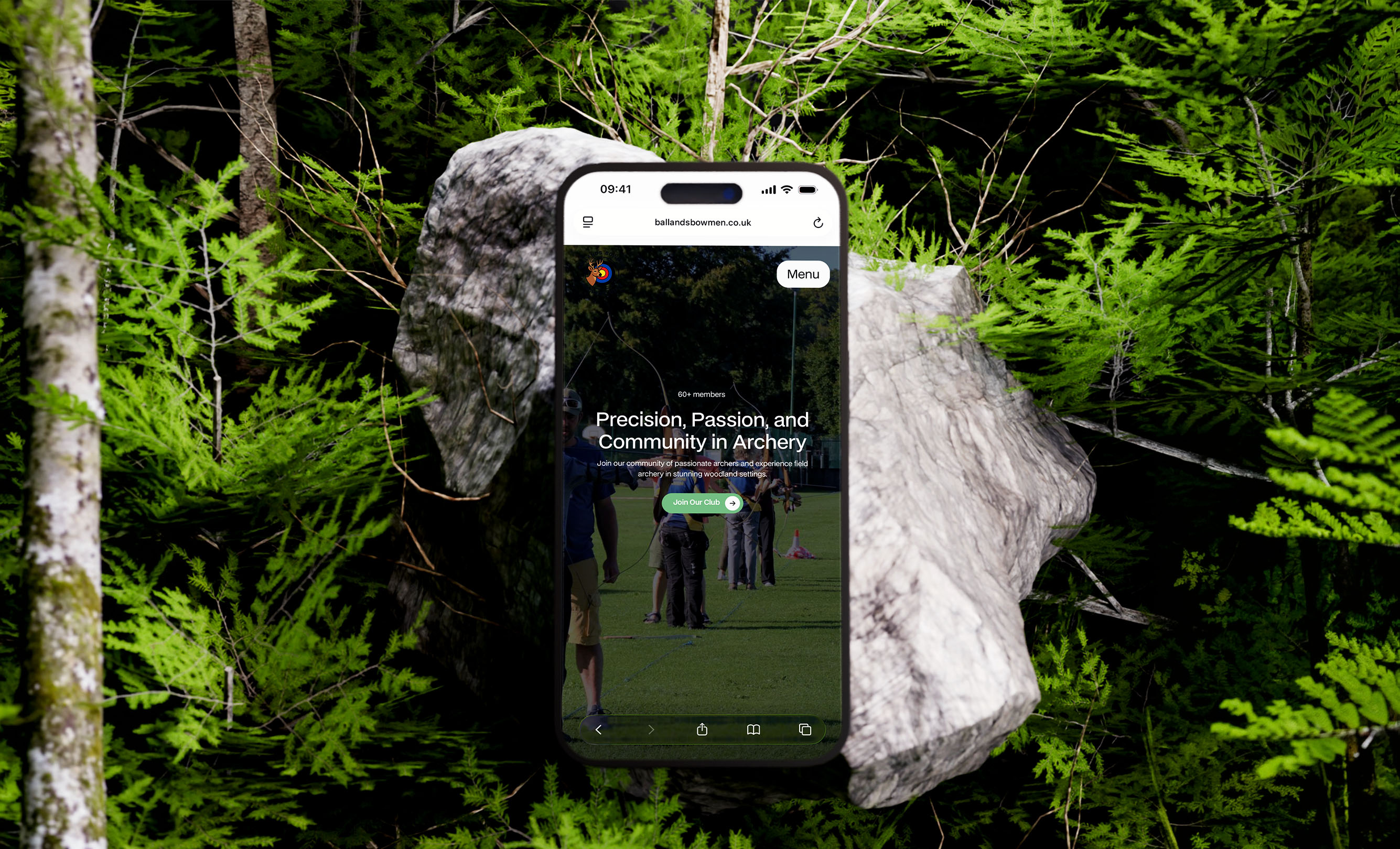Laptop displaying the Ballands Bowmen Archery Club website featuring a green woodland-inspired design and archery imagery.