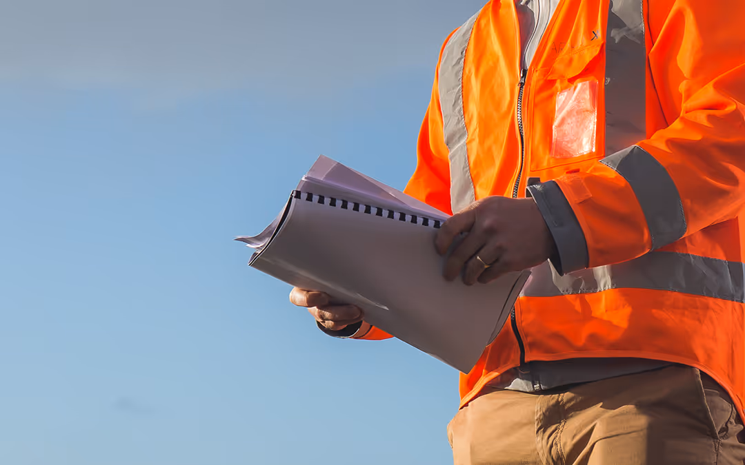 Safety Officer holding incident report folder