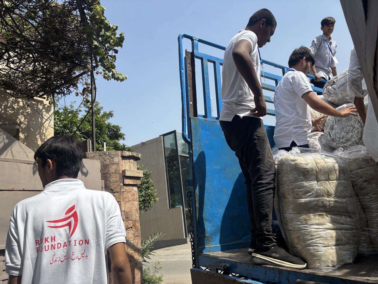 A Rukh Foundation volunteer preparing a relief delivery, Johar Town, Lahore