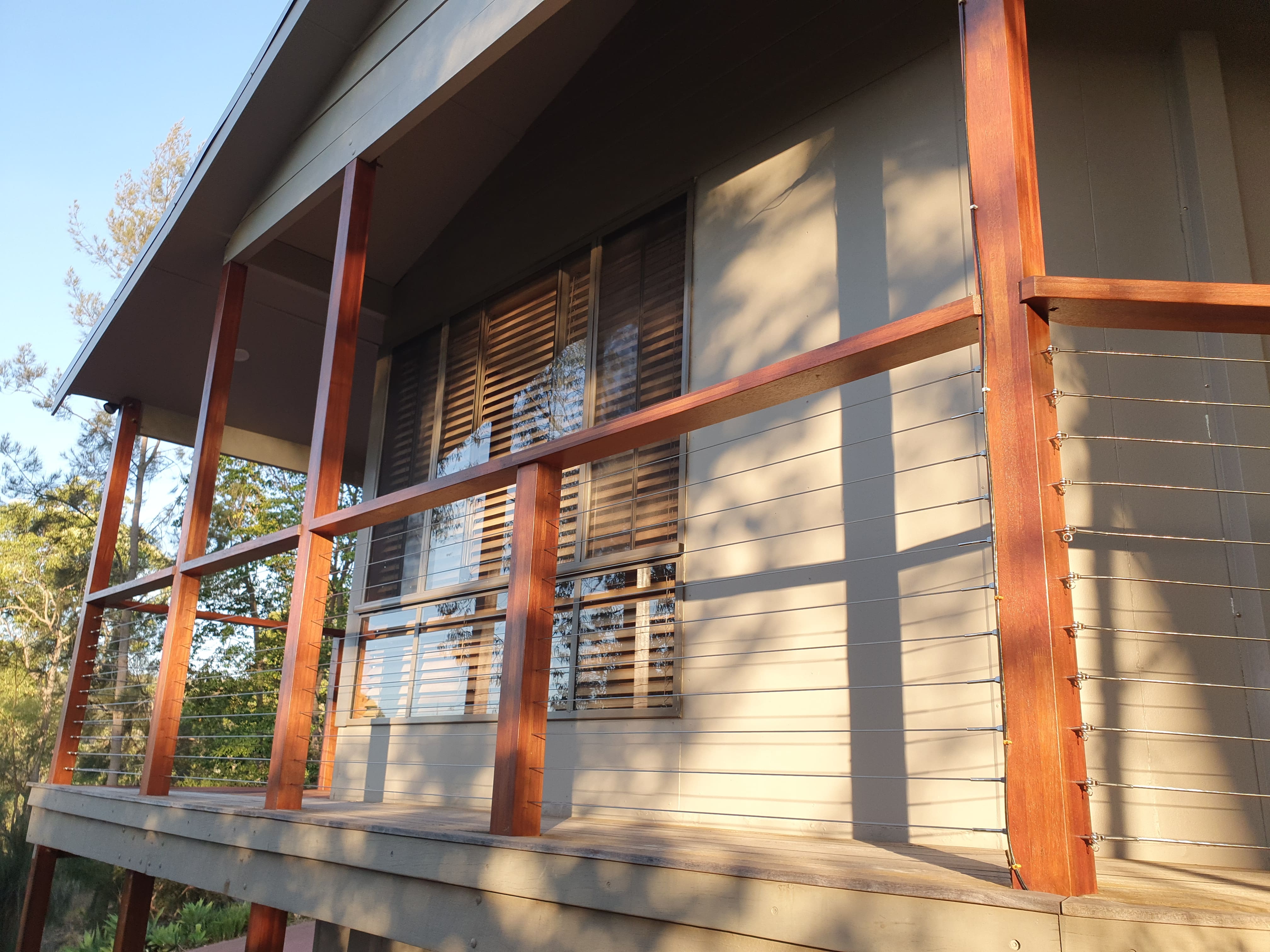 Stainless wire balustrade with timber posts on a home's deck
