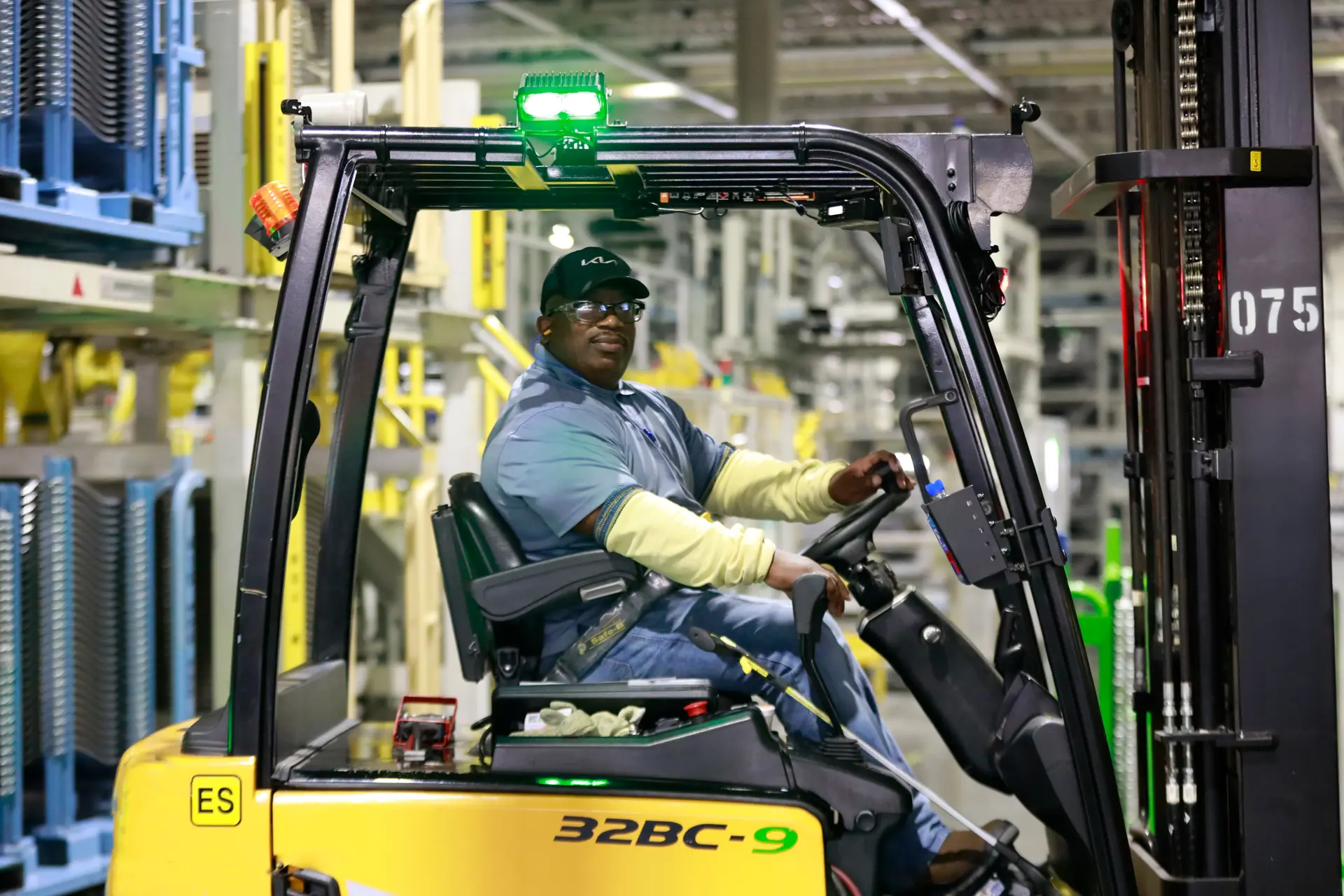 Forklift operator at work in a warehouse