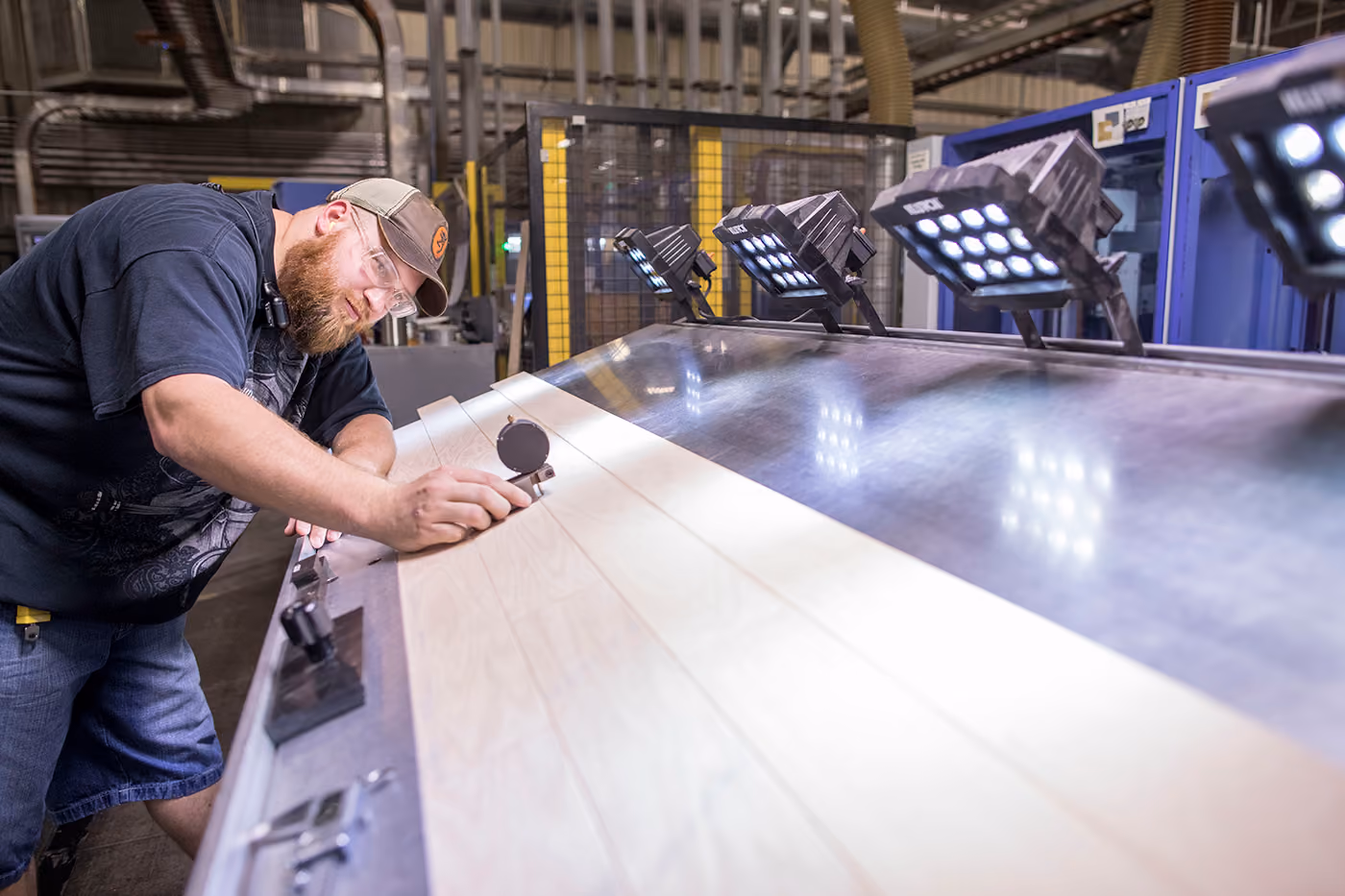 Technician working at a seat production station