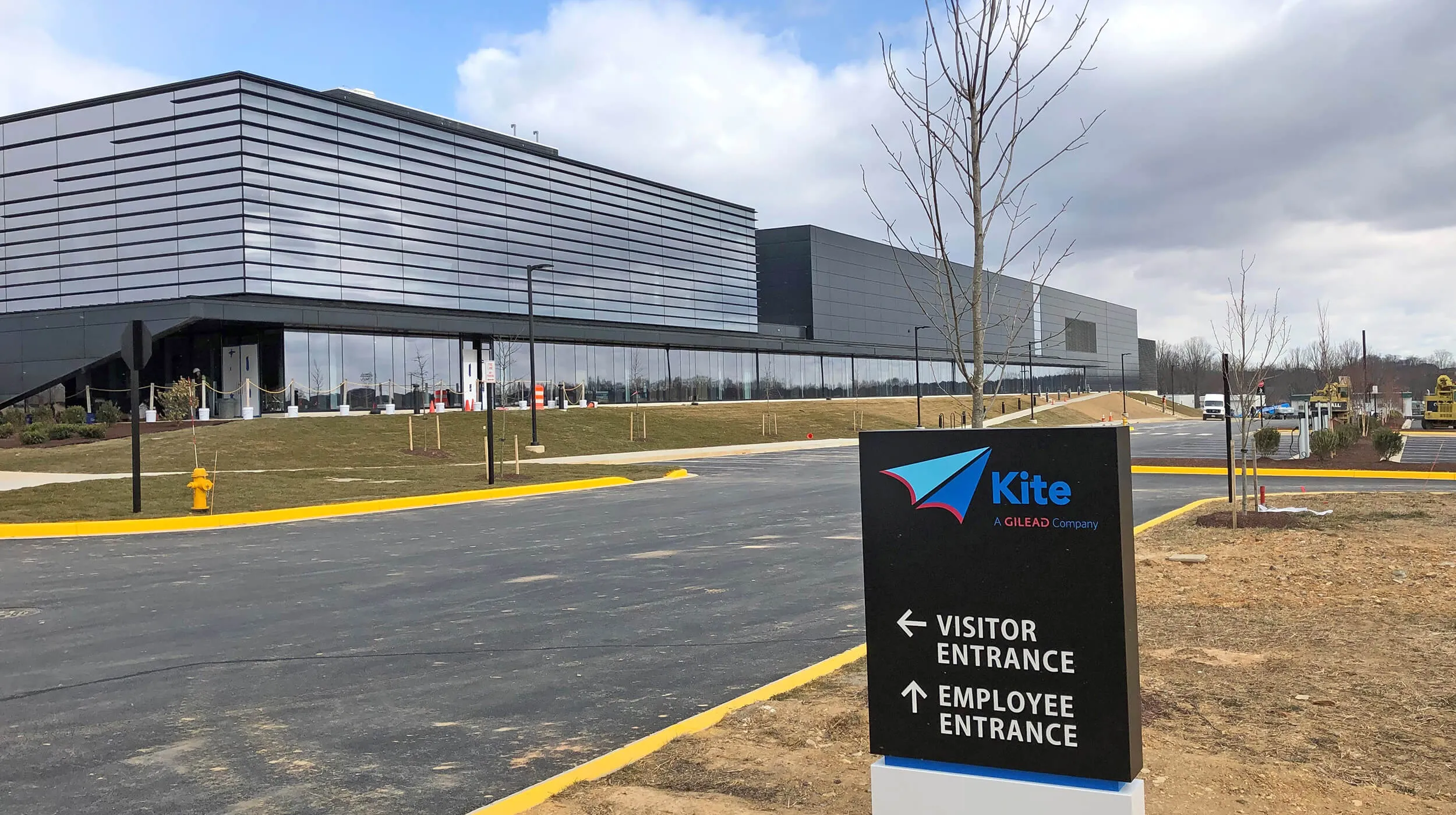 Kite Pharma entrance sign with modern corporate building and parking lot