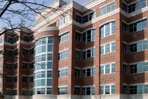 Modern brick and glass multi-story apartment or office building exterior