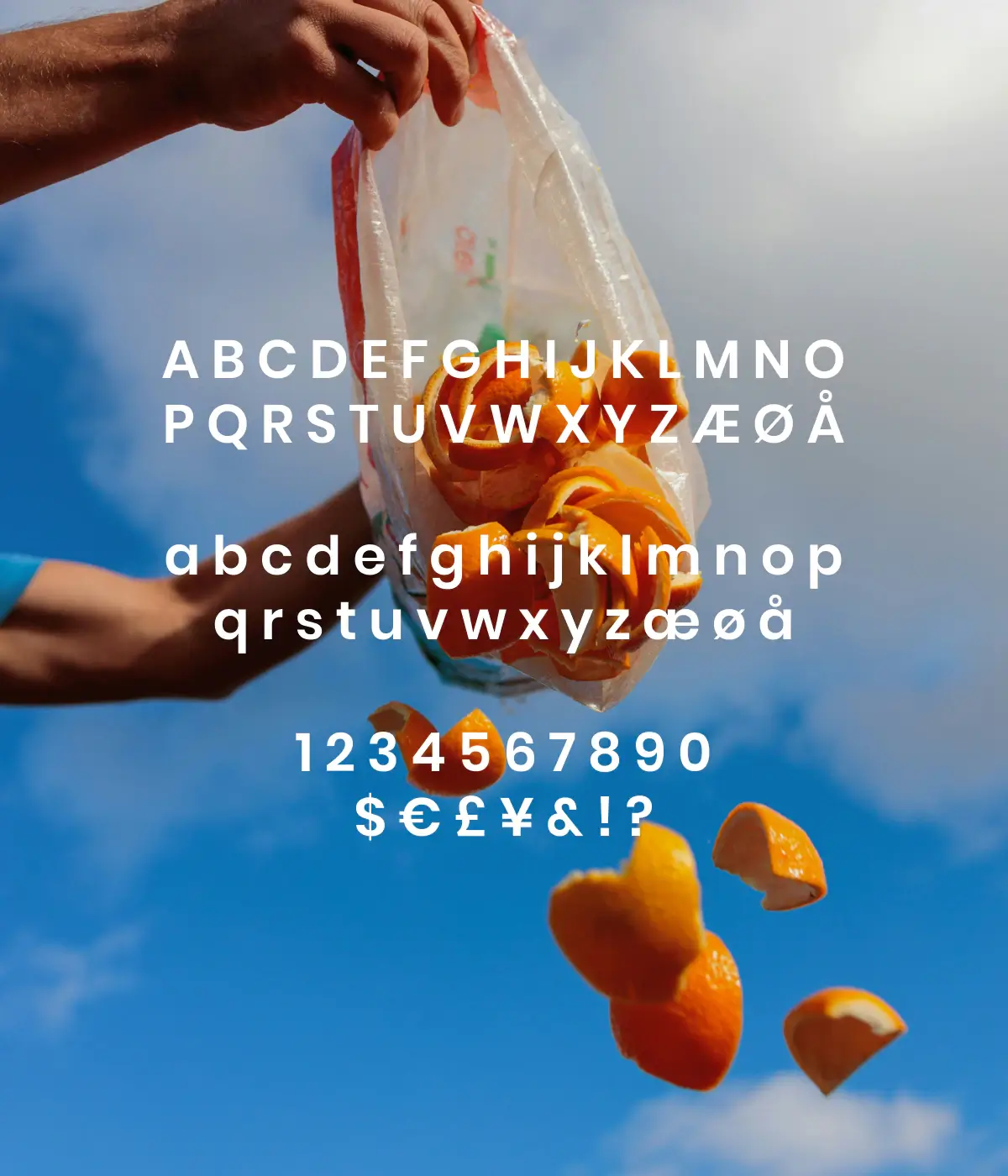 Food waste visual brand identity with expressive typography, oranges, hands, and blue sky, combining bold art direction with meaningful sustainability-focused brand storytelling.