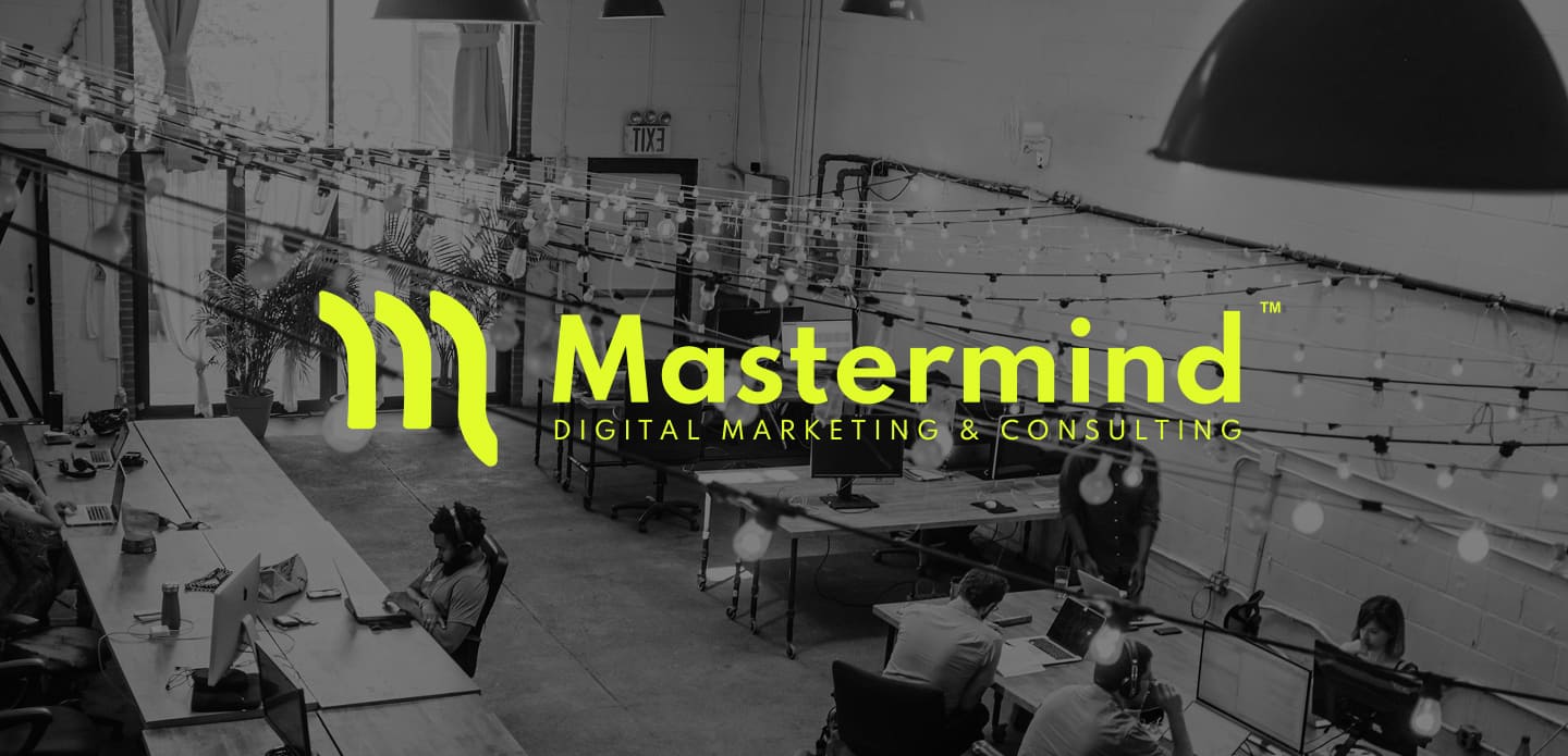 Black and white office picture with bright green company logotype