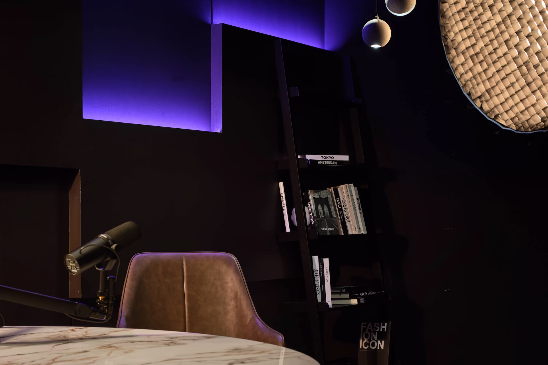 Two mobile screens of Podyx app showing step 1 with session duration, number of people selection, and March 2025 calendar; step 2 with studio selection named Onyx, seating capacity, location, and studio image with blue lighting.