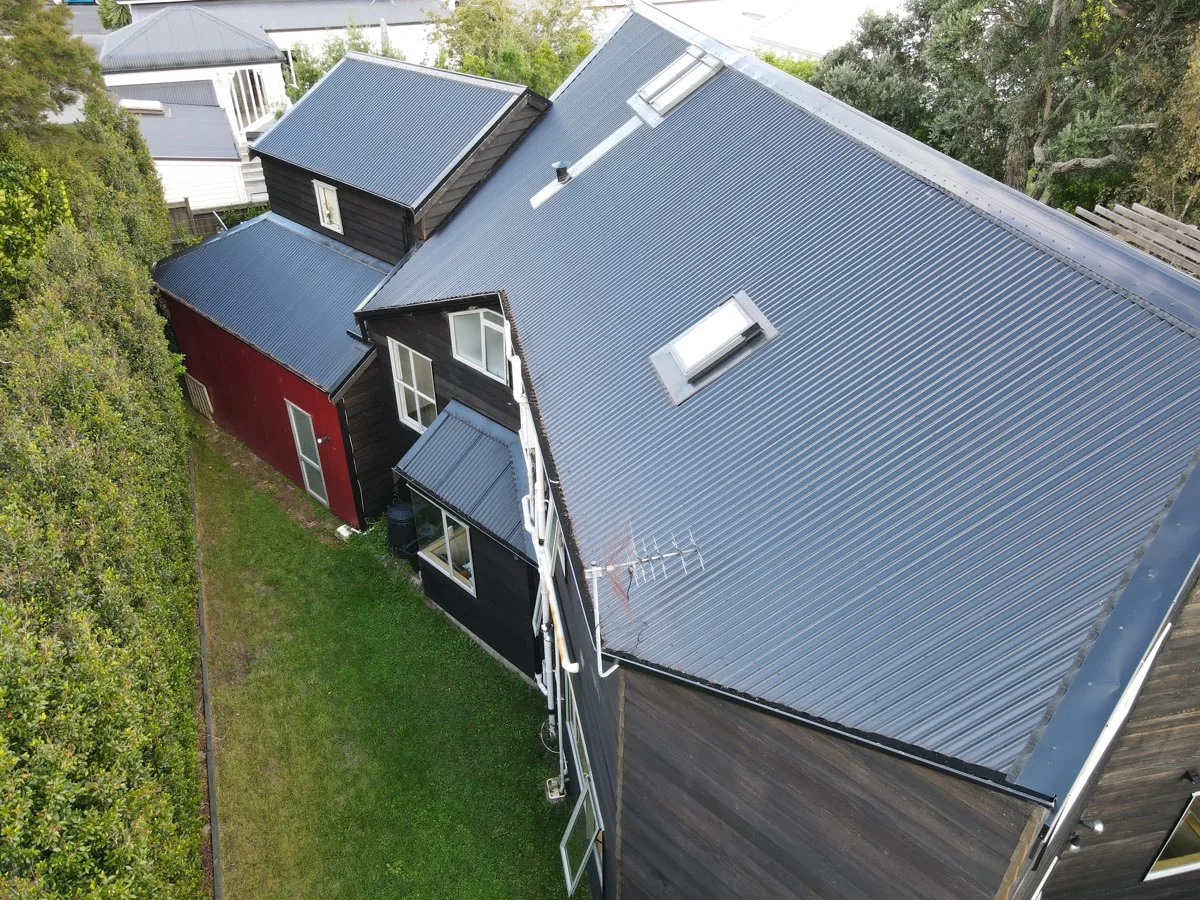Lower roofs and black spouting on a Herne Bay reroof