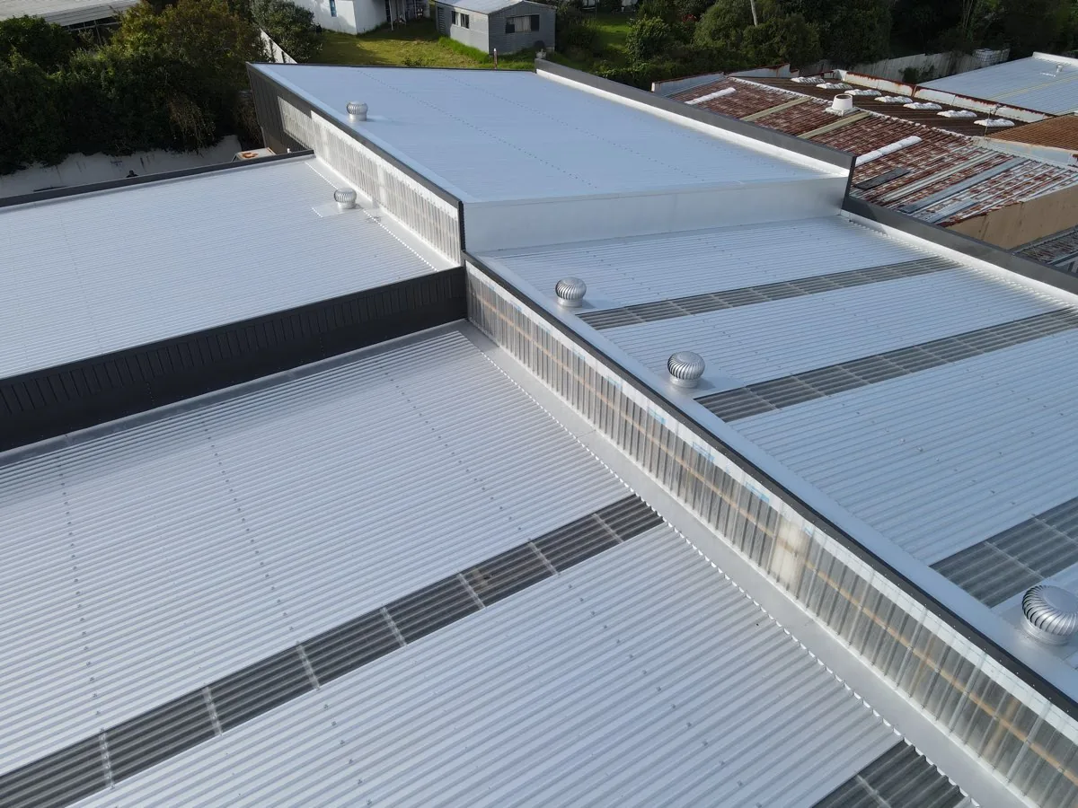 Translucent Webglass wall sheeting between roof levels in Glenfield