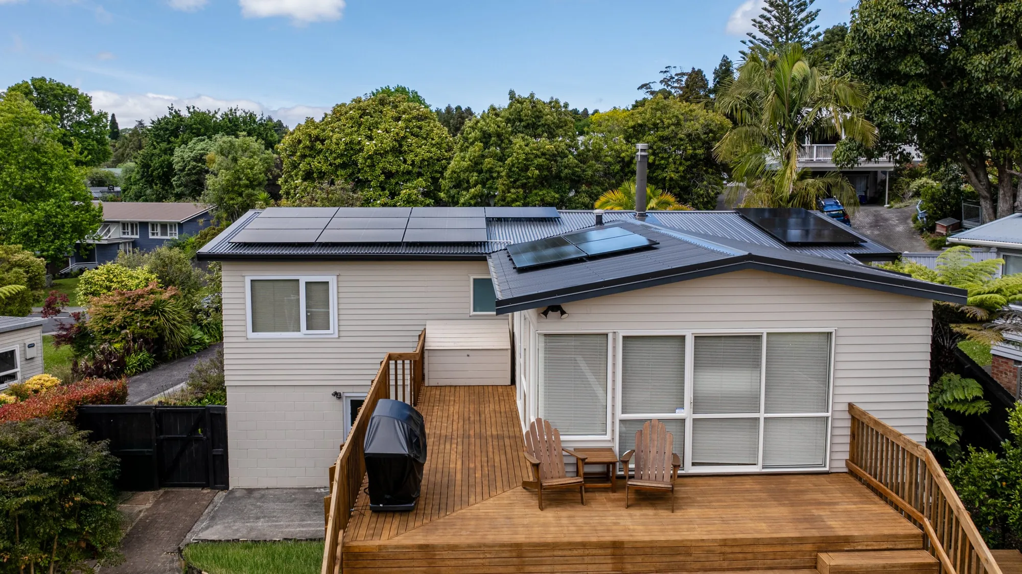 Rear of the reroofed Hillcrest home and deck