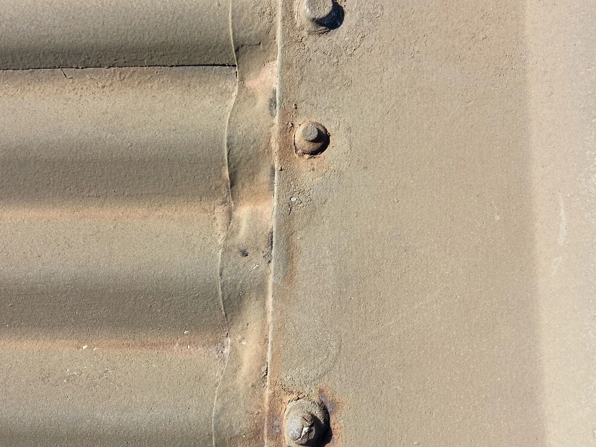 Rusted fixings along an old flashing on the original Hillcrest roof