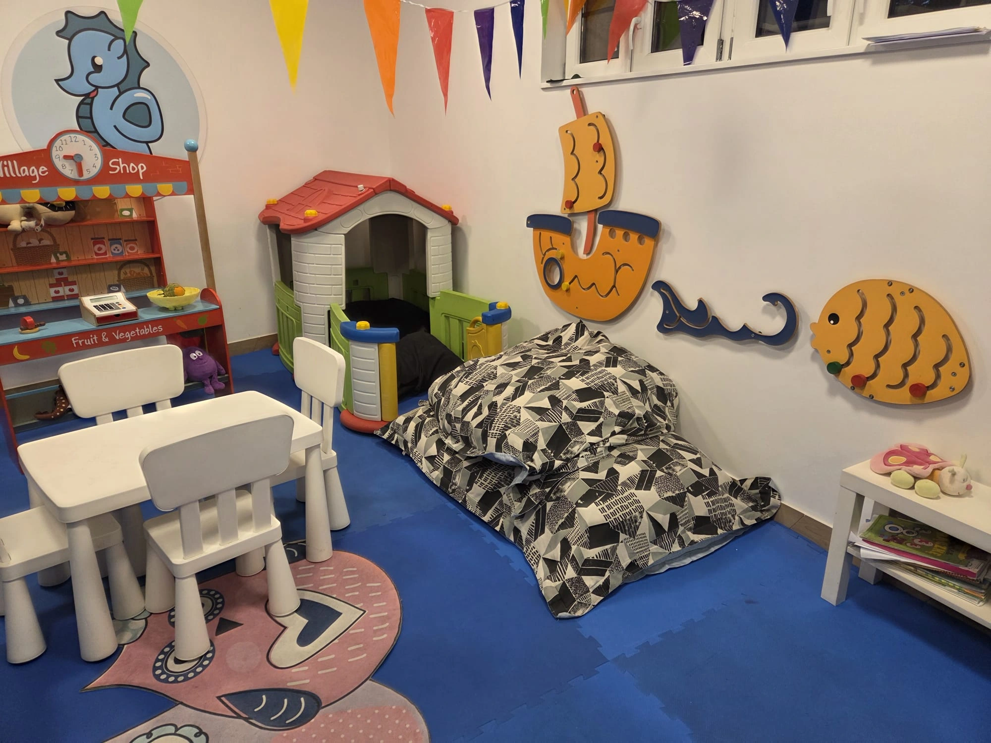 Room for children with colorful toys and playroom