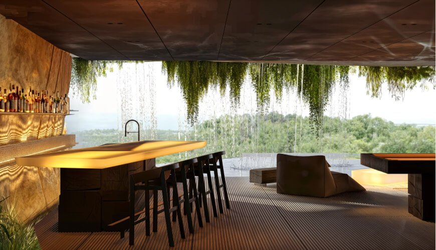 The Cave is a large semi-open lounge space with a panoramic sunset view, revealed between two powerful cantilevered volumes of the building.