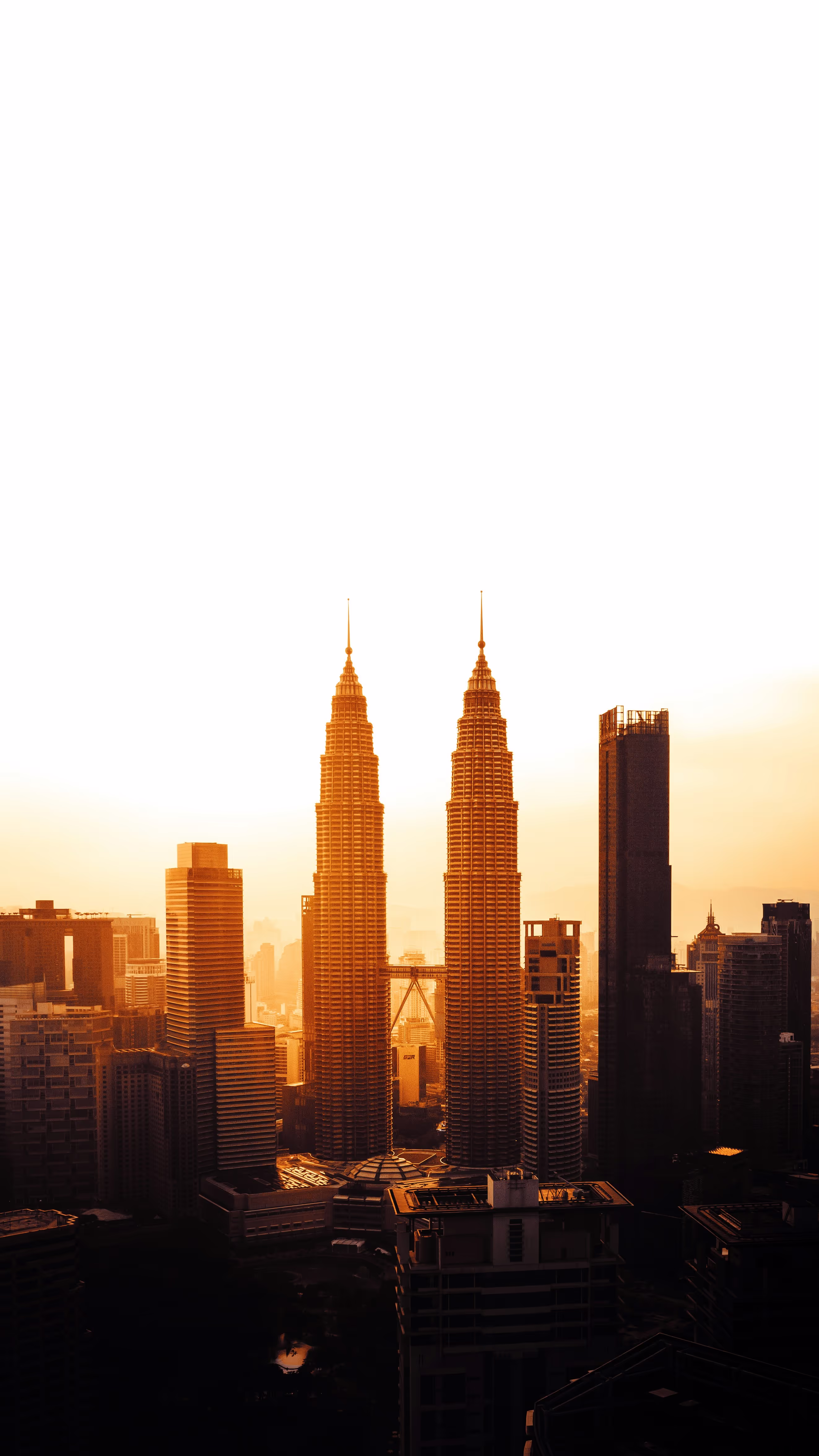 Petronas Twin Towers in Kuala Lumpur at sunset
