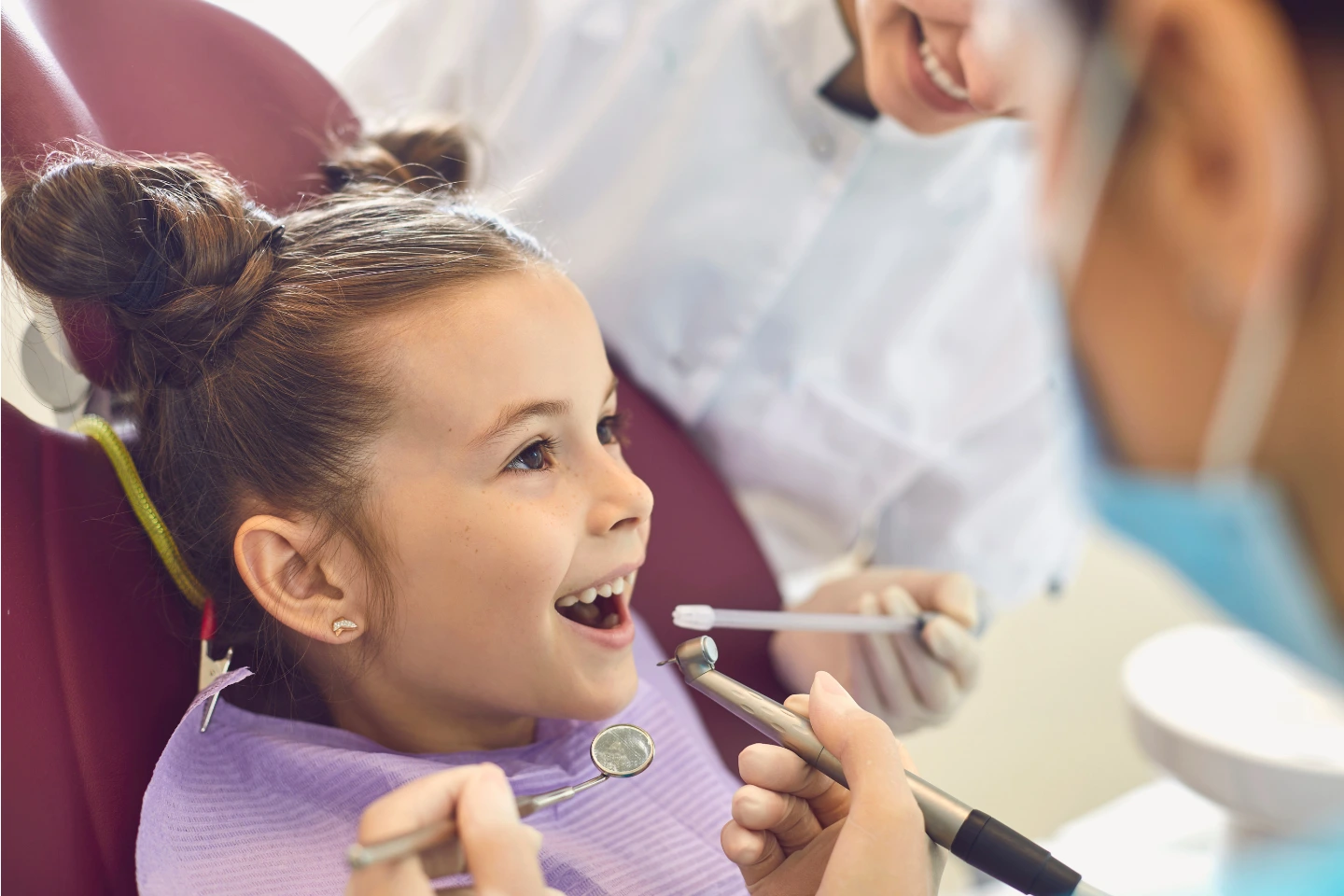 Child having a routine dental cleaning