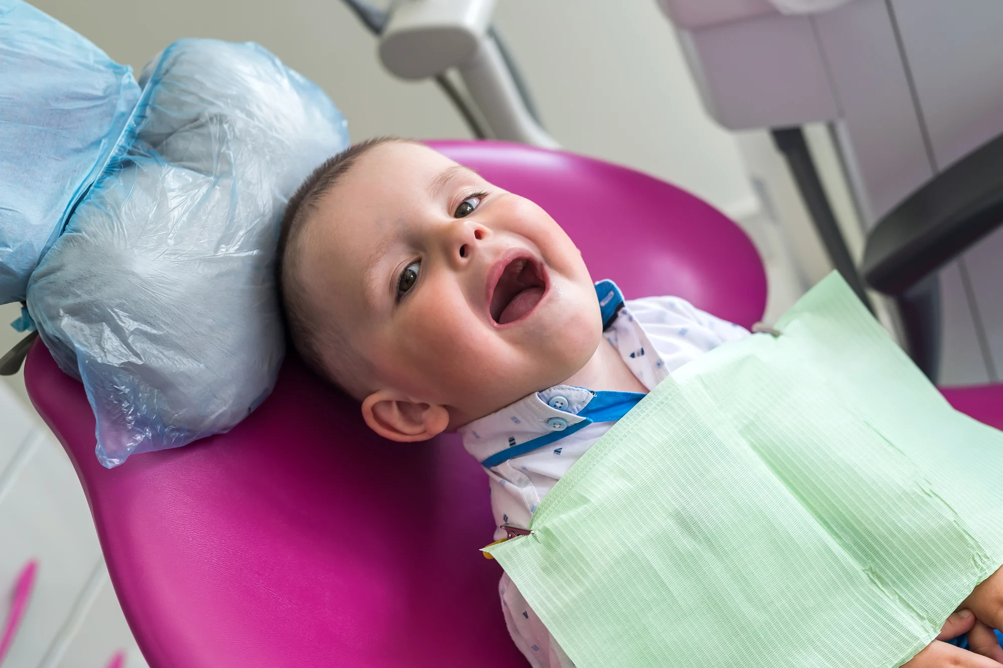 Infant's biannual dental checkup for oral hygiene