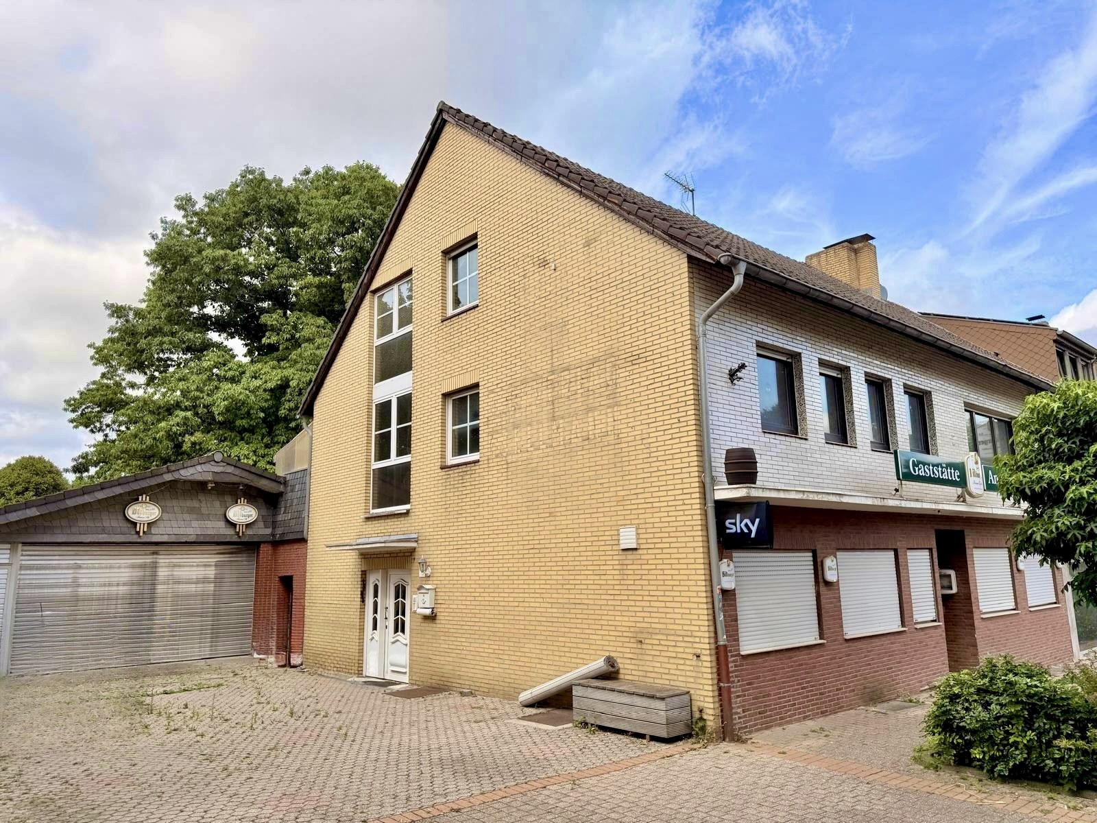 Baesweiler | Familienfreundliches Haus mit Gewerbeanteil in Setterich!