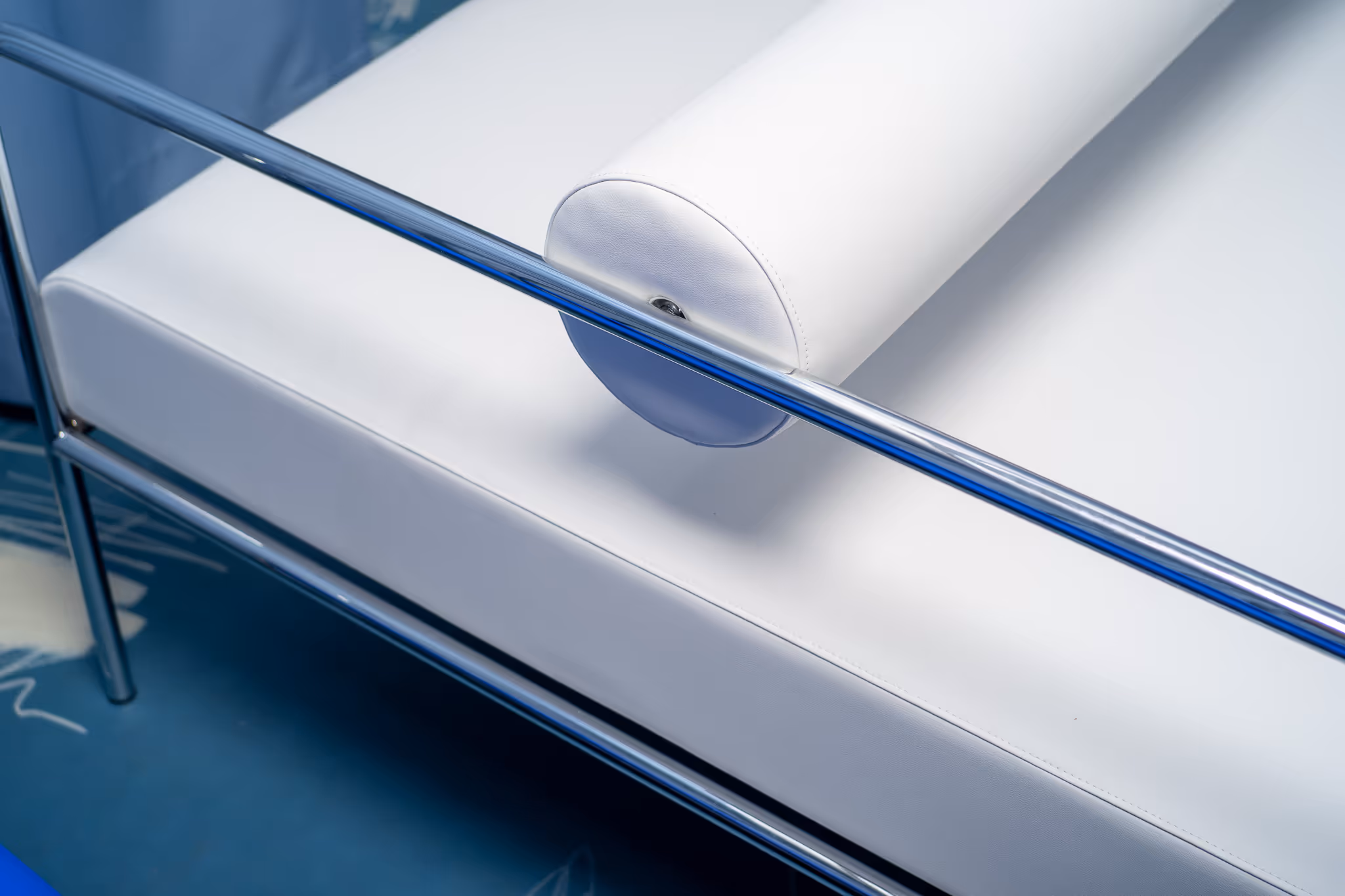 Chrome and White leather modern armchair detail