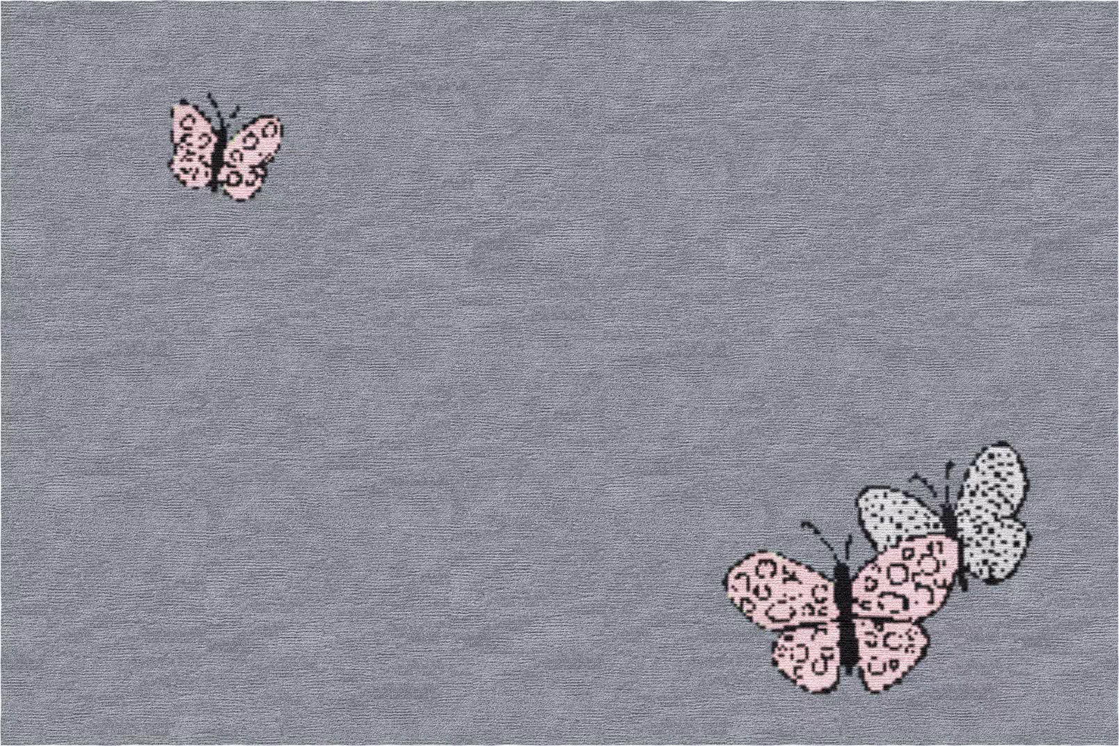 Zoomed-in section of hand-drawn butterfly motif on gray designer rug, crafted in Nepal with exceptional textile artistry.