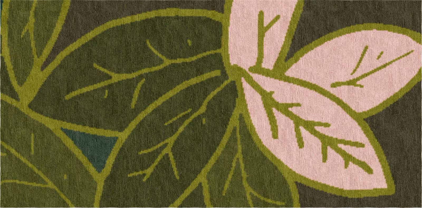Detail of hand-tufted rug showing foliage motif in various shades of green with pink leaf accent.