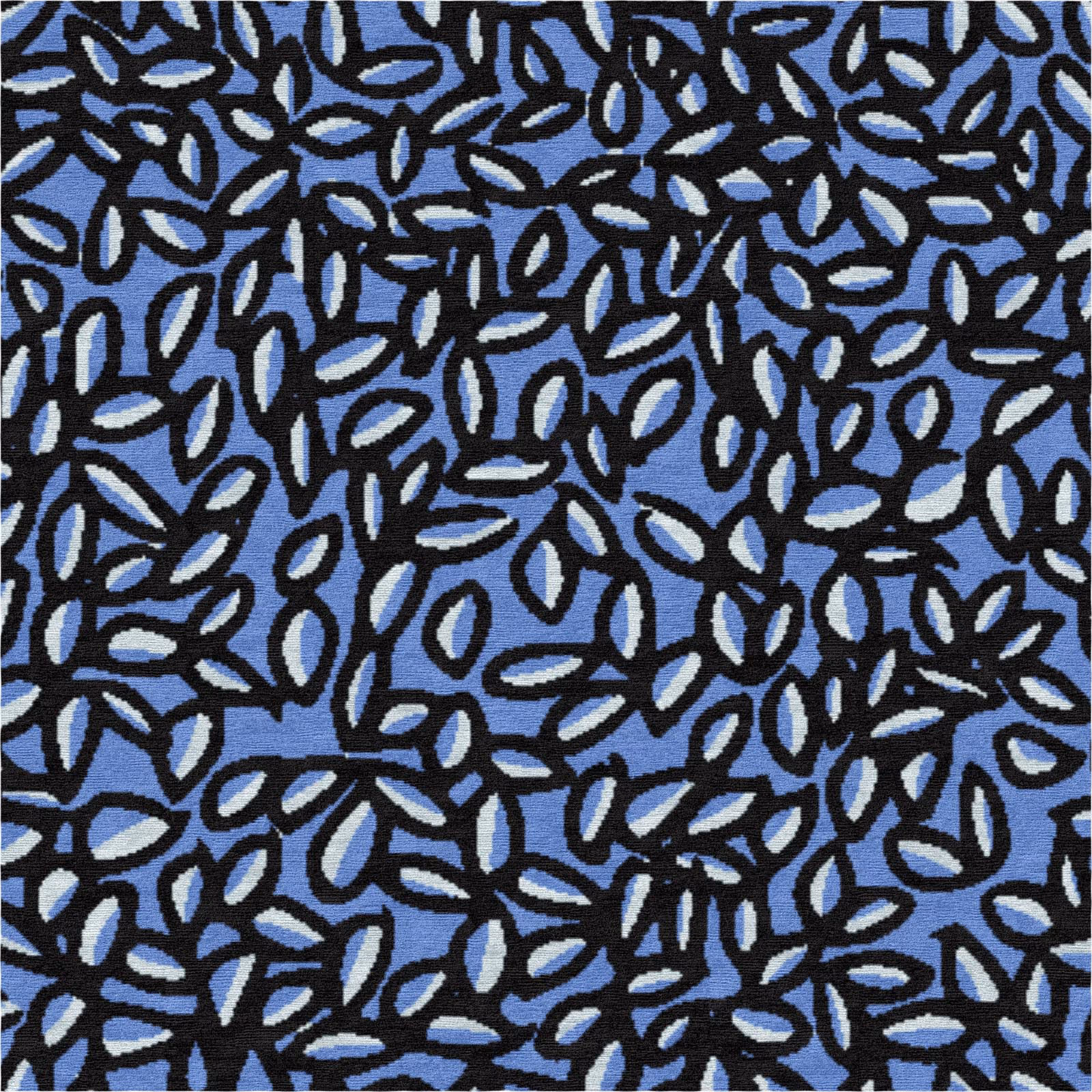 Detail of a blue hand-knotted wool rug showing abstract leaf shapes with black contours and white reflections