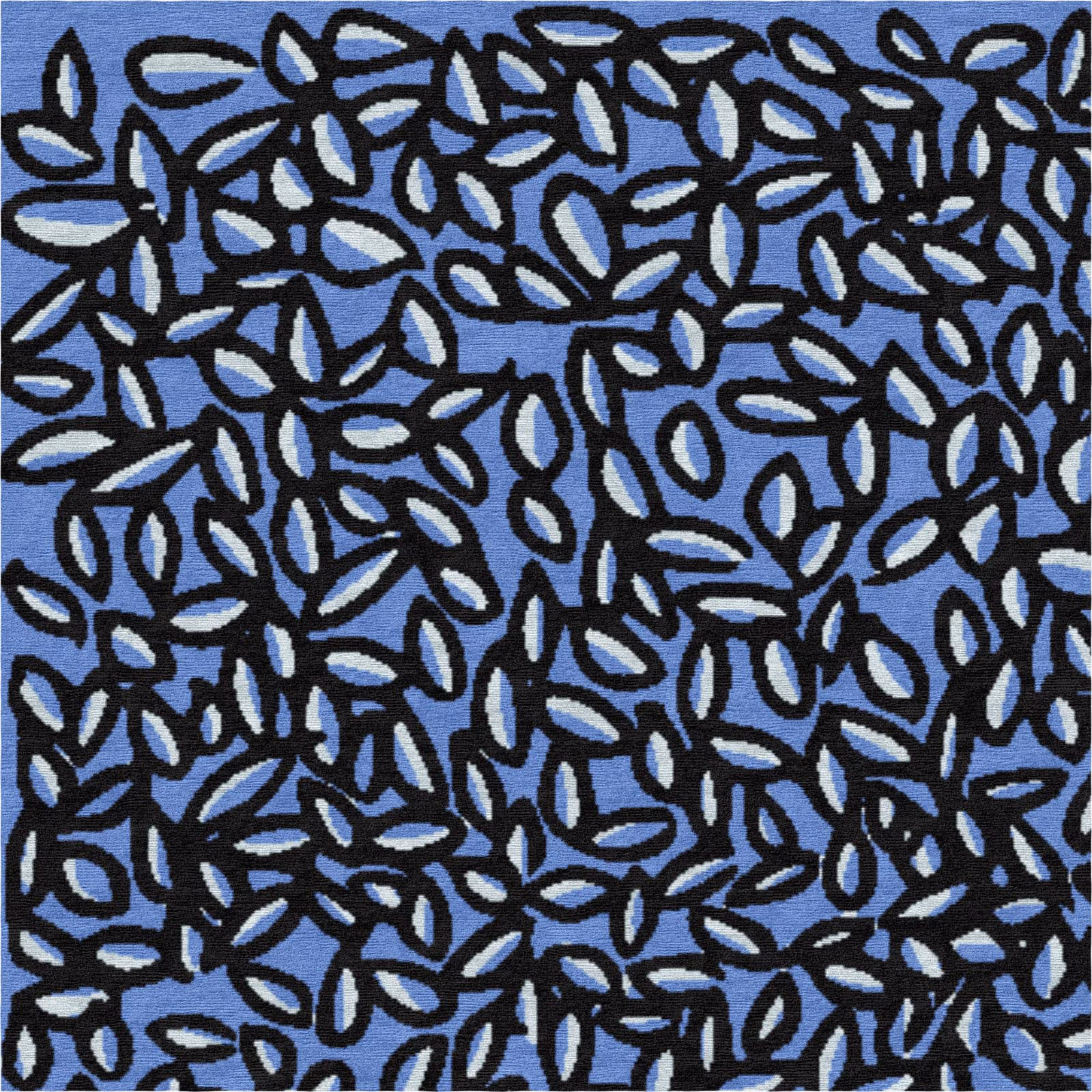 Close-up of a navy blue botanical rug surface with dense, layered leaf motifs