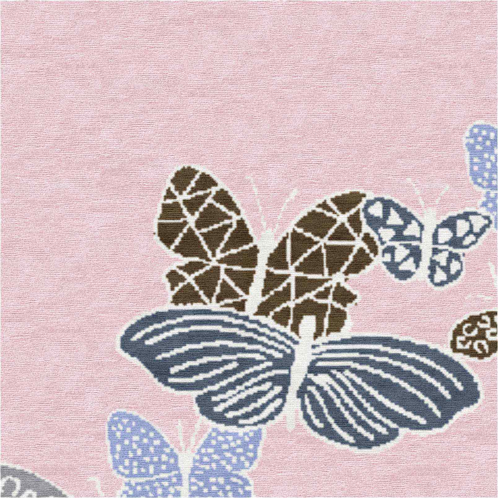 Close-up of blue and beige butterfly details on hand-knotted rose rug, intricate linework and subtle color transitions
