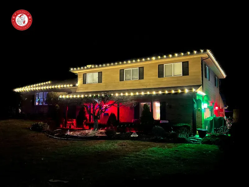 professional christmas light installation on a two story home