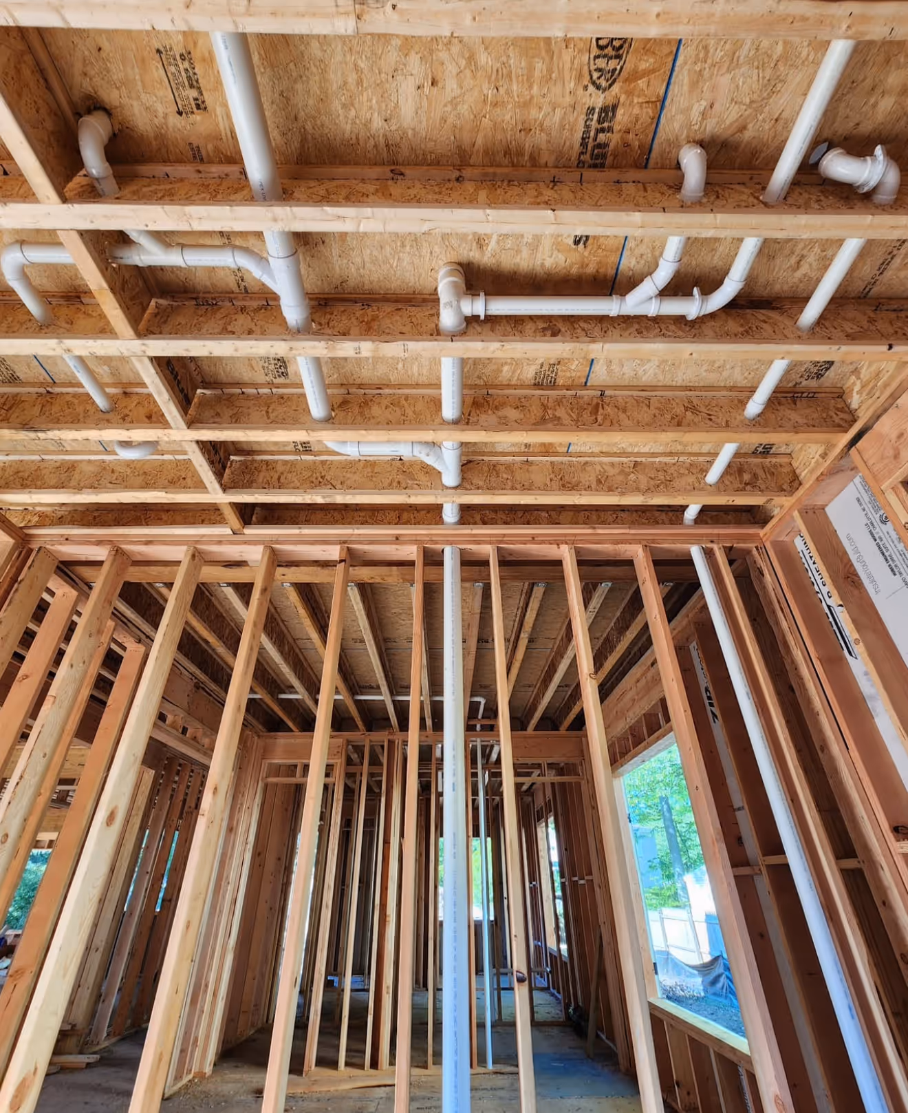 Rough plumbing progress during new construction project in NJ.