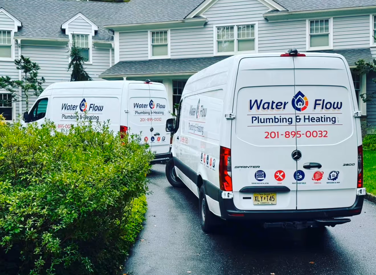 Our vans parked outside residential home.