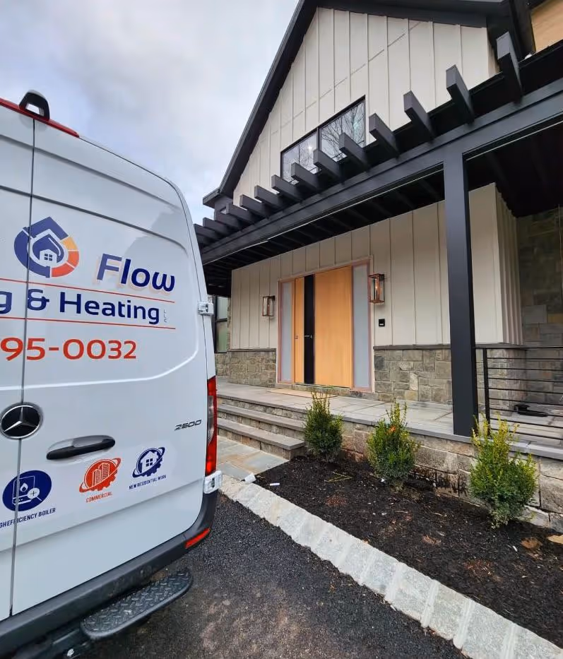Our service truck parked outside of a completed home that we worked in.