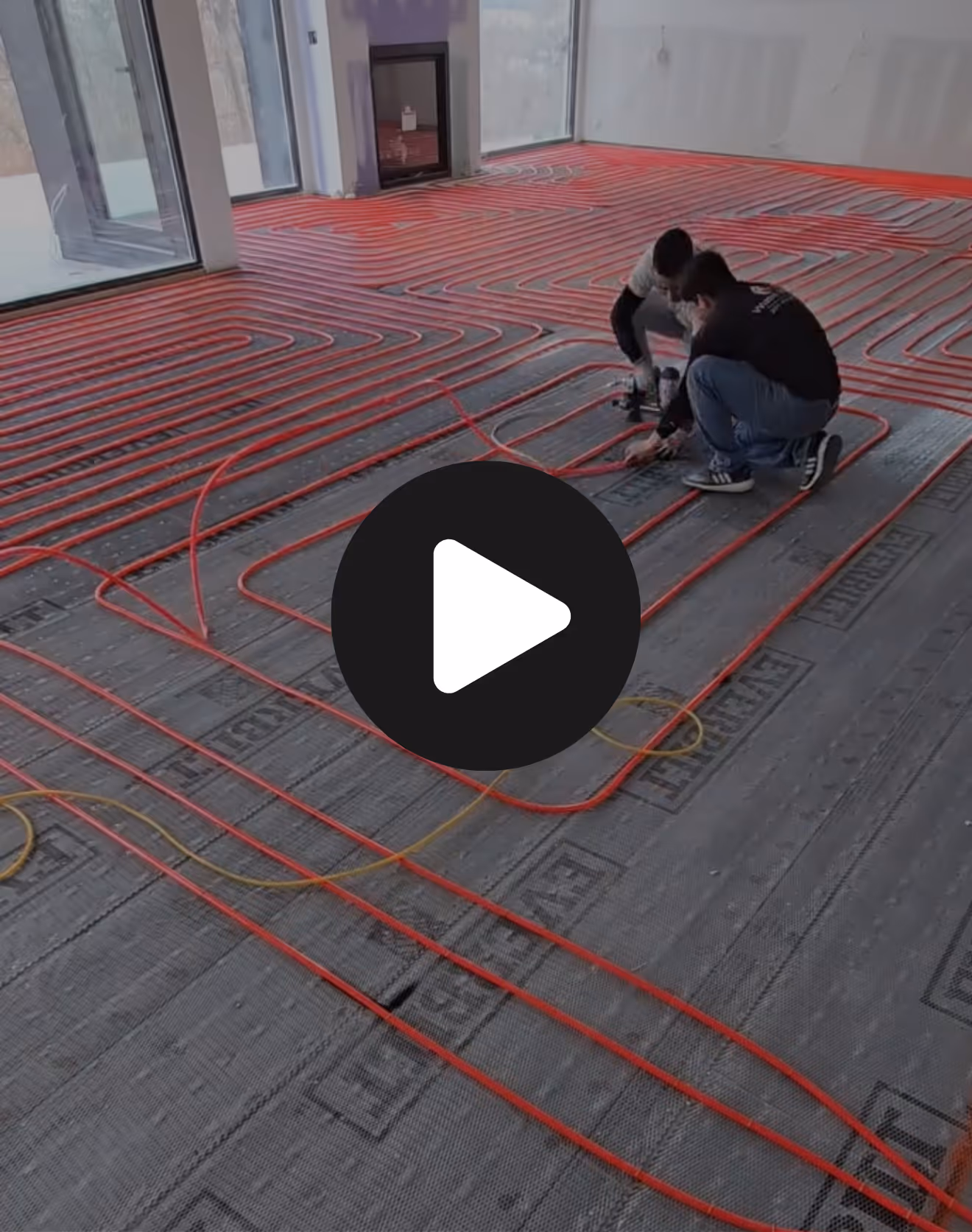 video preview of our team installing radiant heat flooring.