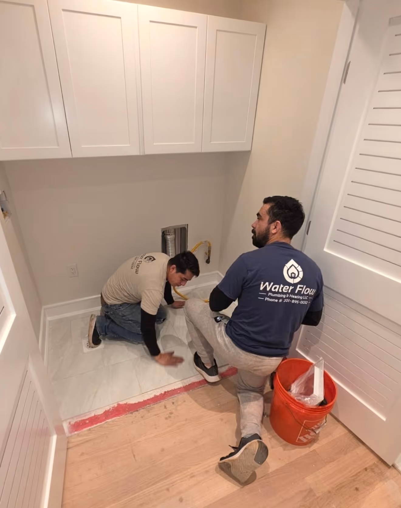 Our team installing new laundry system in NJ home.