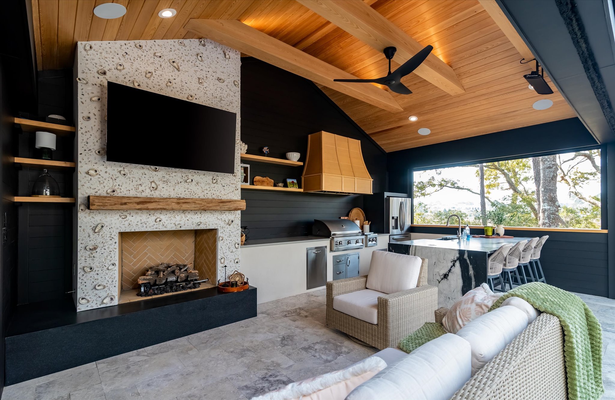 covered poolside cabana in South Carolina with fireplace and kitchen - BuiltBy3