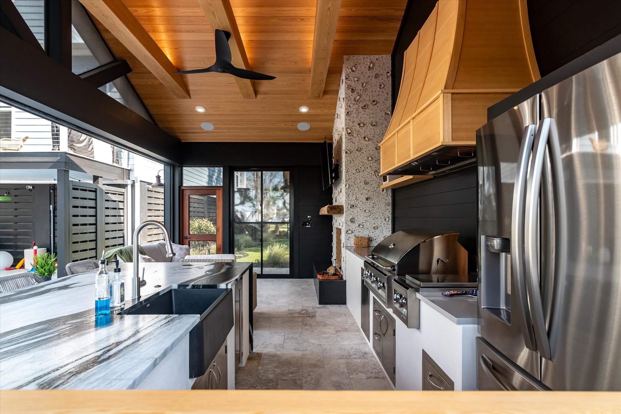 covered cabana in South Carolina with fireplace and kitchen - BuiltBy3