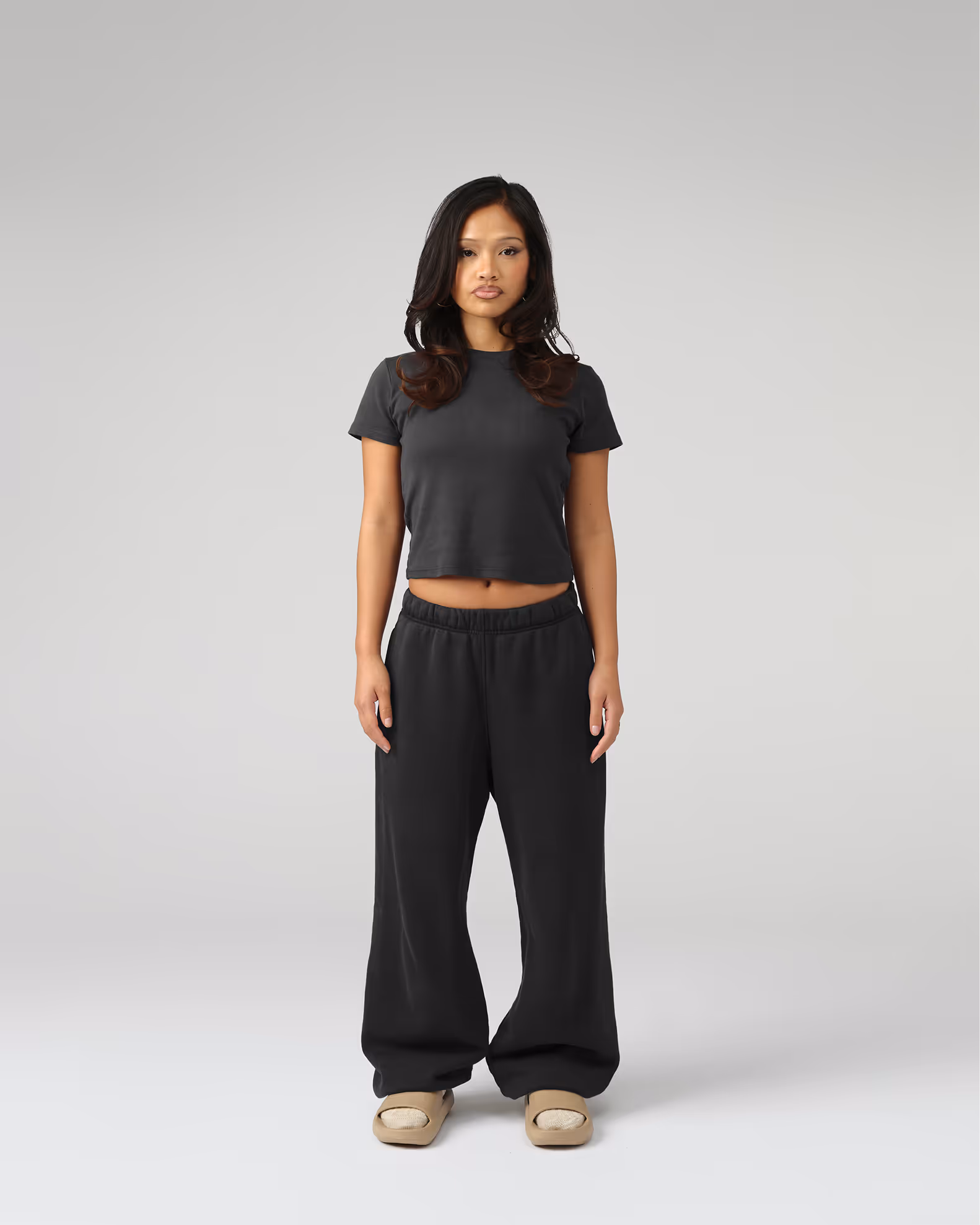 A modern silhouette with a shorter, more fitted profile with cap sleeves for contemporary styling. Crafted from premium organic cotton 1x1 rib for exceptional stretch, recovery, and a luxurious feel against the skin.