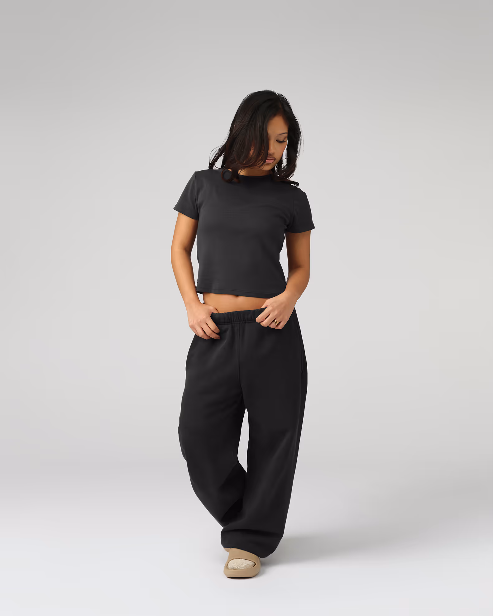 A modern silhouette with a shorter, more fitted profile with cap sleeves for contemporary styling. Crafted from premium organic cotton 1x1 rib for exceptional stretch, recovery, and a luxurious feel against the skin.